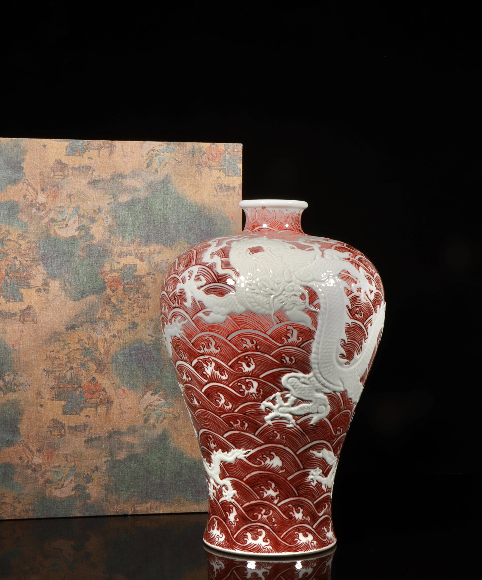 A Red Underglazed Meiping Vase with Dragon Motif: A Red Underglazed Meiping Vase with Dragon Motif. Height: 13.98in; Diameter: 9.65in.