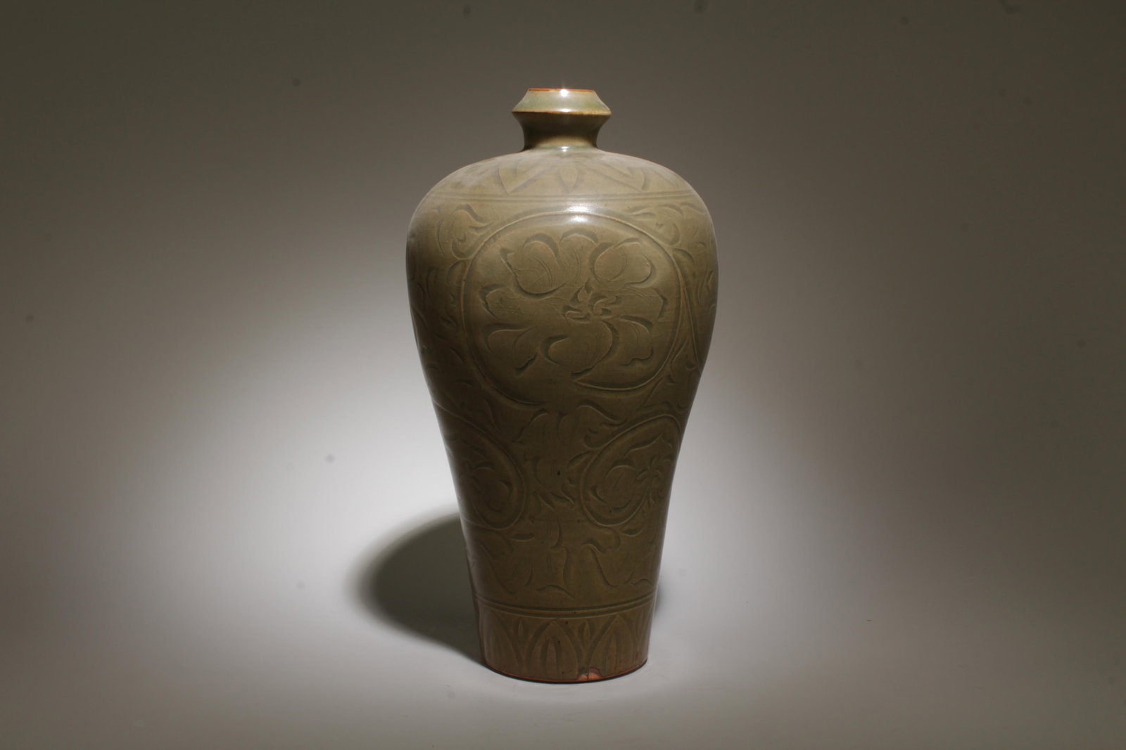 A Yaozhou Meiping Vase: A Yaozhou Meiping Vase. Dimension: 10.75" x 5".