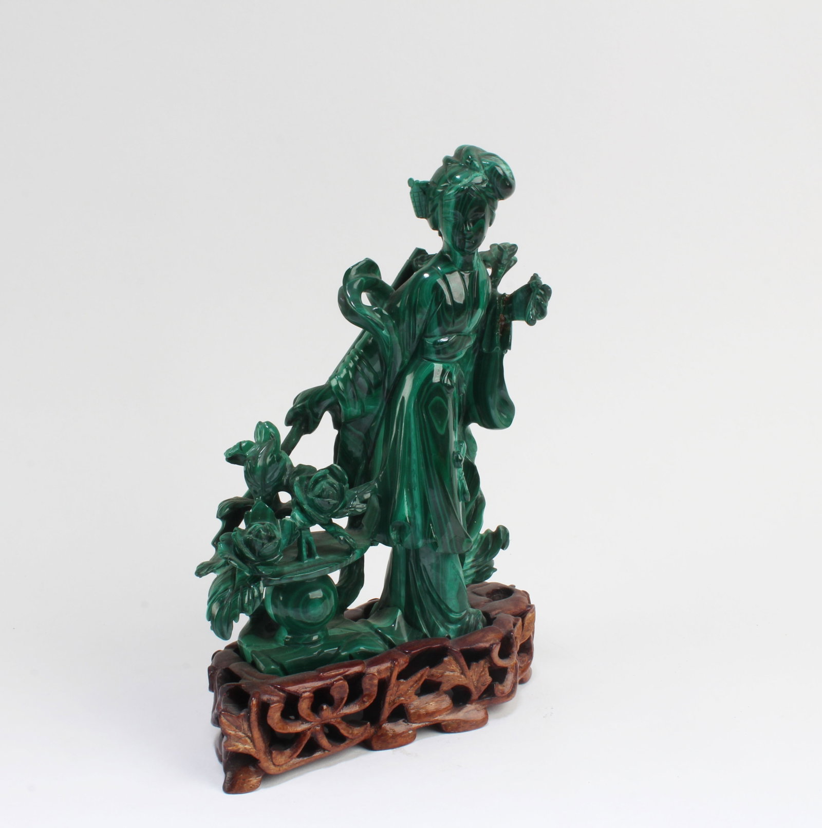 A Carved Malachite Figurine With stand: A Carved Malachite Figurine With stand. Height: 4.75"