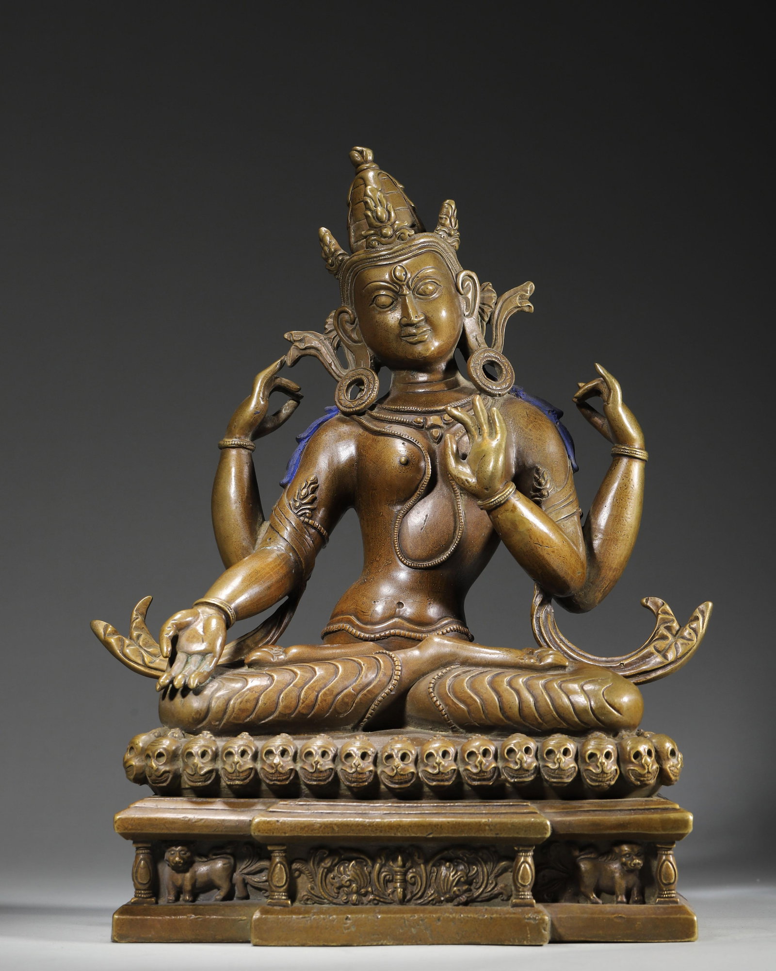 A FINE TIBETAN COPPER FIGURE OF A FOUR-ARMED PROTECTOR DEITY, 18TH CENTURY (1 of 9)