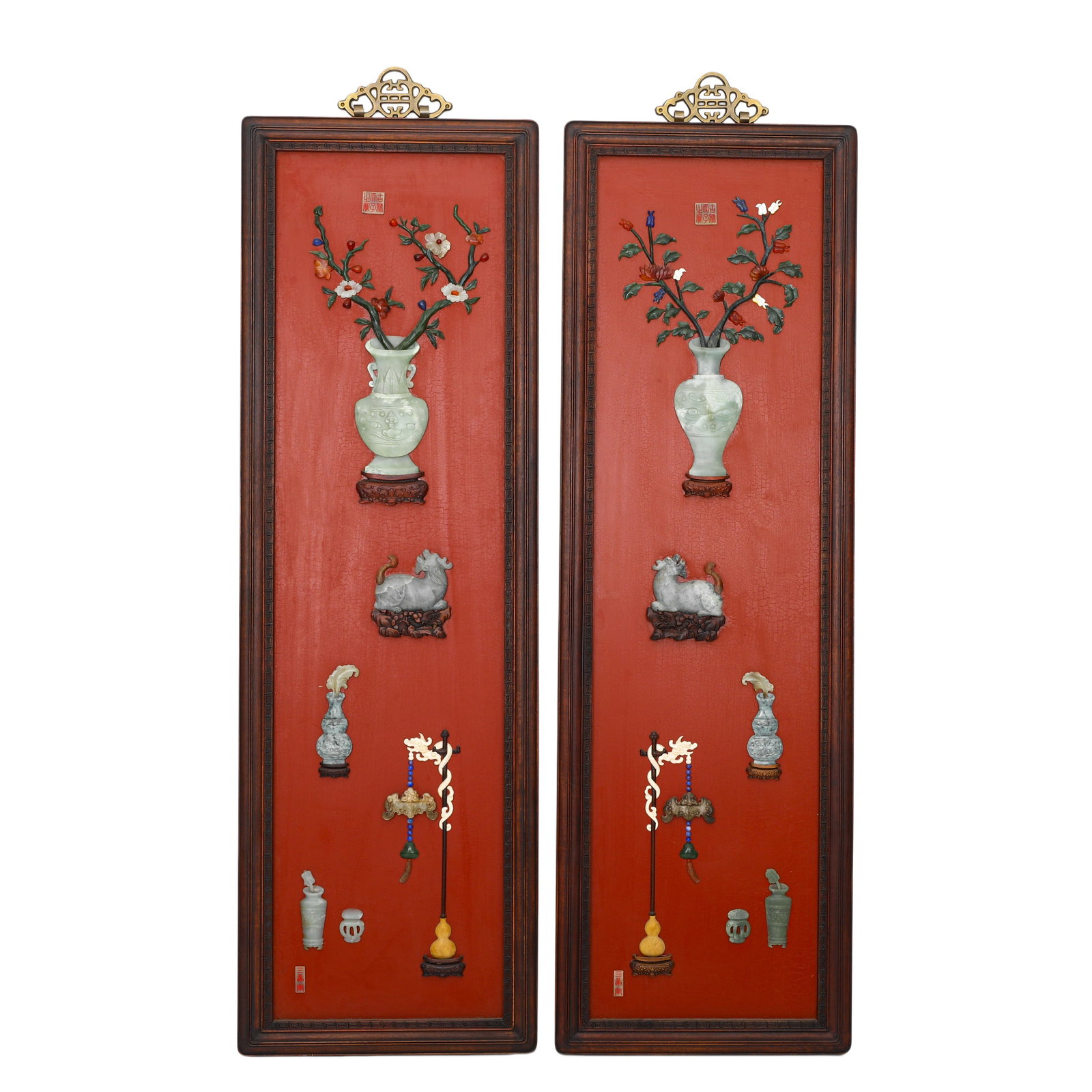 QING DYNASTY RED WOOD FRAME RED LACQUER GROUND HUNDRED TREASURES INLAID WITH ANCIENT PATTERNS: H:107cm (42.13in) W:34.5cm (13.58in) Weight:10000g (22.05lb)This is a pair of rectangular hanging screens in the Qing Dynasty style, framed in red wood with a rich vermilion lacquer ground.