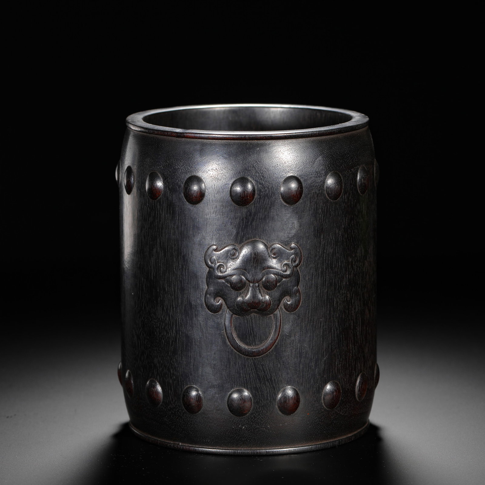 QING DYNASTY: A PEN HOLDER WITH A HEAD PATTERN MADE OF ROSEWOOD DRUMS AND NAILS (1 of 12)