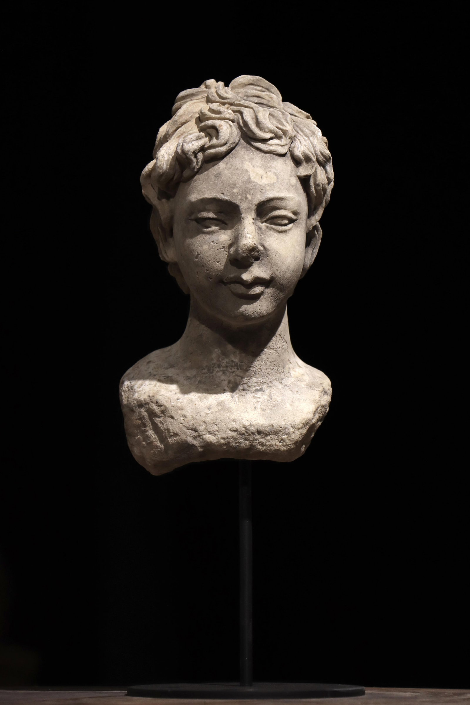 A 3TH-CENTURY ANCIENT GREEK STONE-CARVED HEAD: Total height: 39cm (15.35in) Net height: 24cm (9.45in)