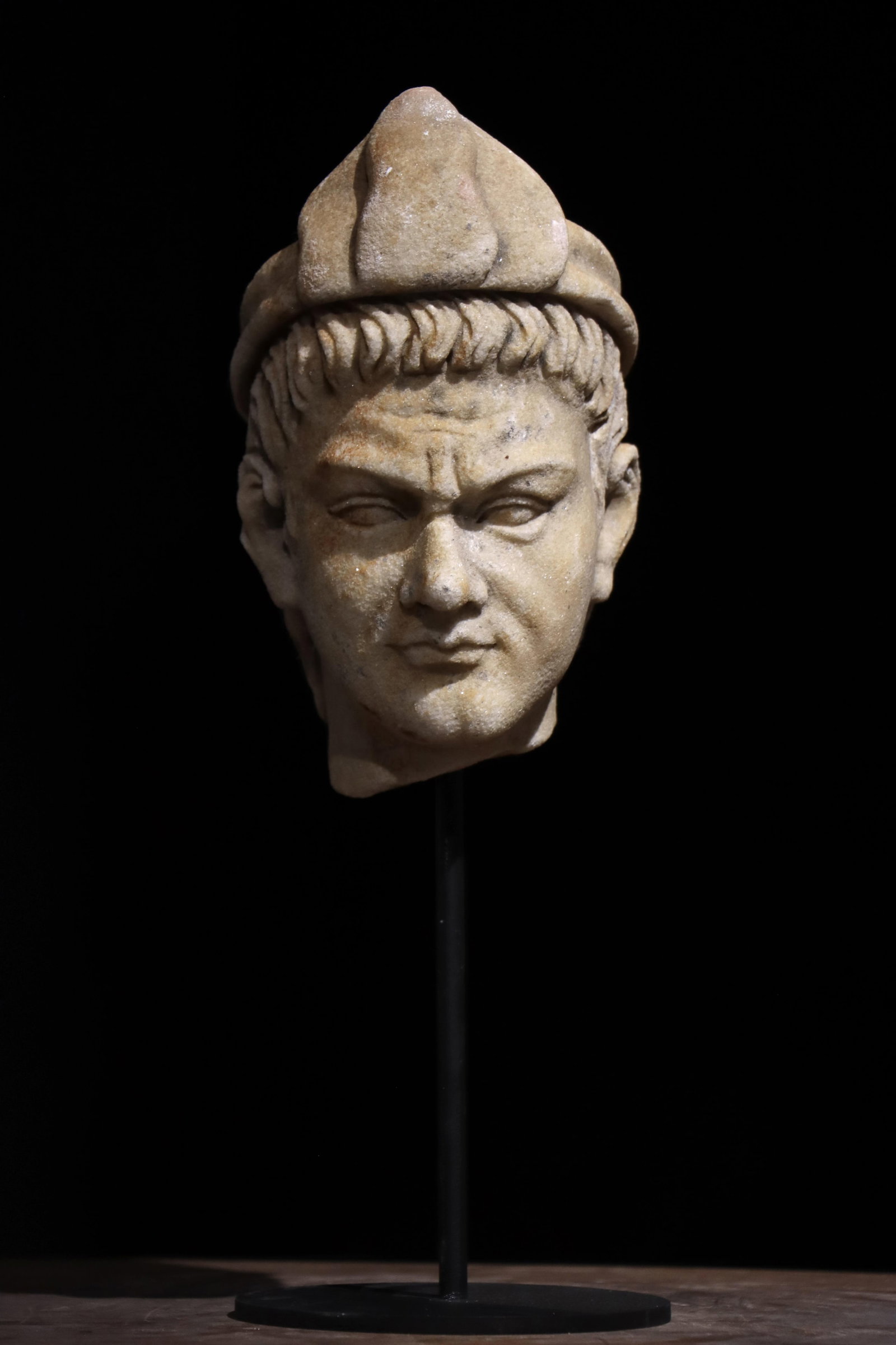 A 3TH-CENTURY ANCIENT GREEK STONE-CARVED HEAD: Total height: 33cm (12.99in) Net height: 21cm (8.27in)