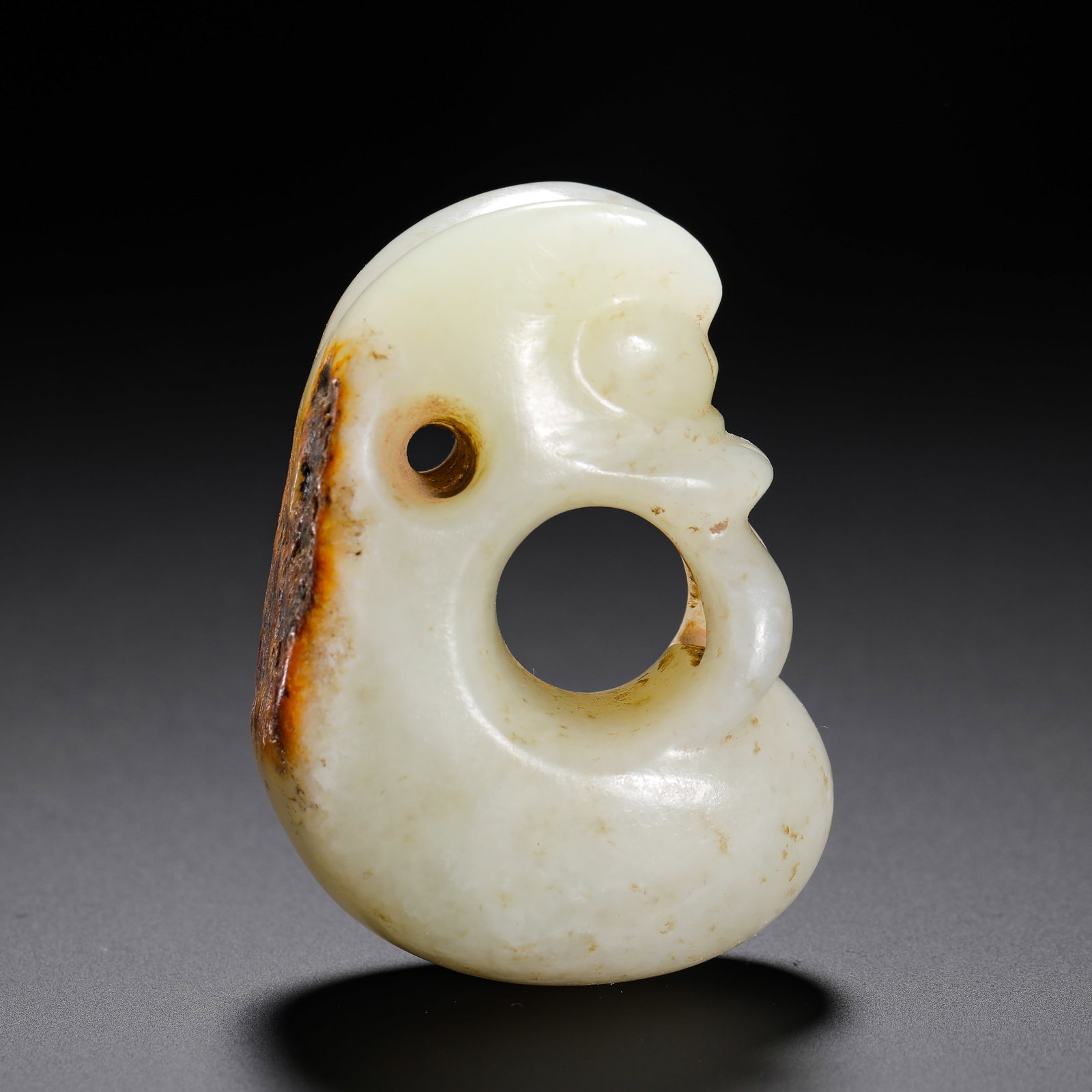 RED MOUNTAIN CULTURE JADE PIG-DRAGON: H:5.8cm (2.28in) W:4.3cm (1.69in) Weight:90g (0.20lb)Its canonical form dates to the Hongshan Culture (Late Neolithic Age), around 5,000-5,500 years ago. Identical specimens have been unearthed in sac