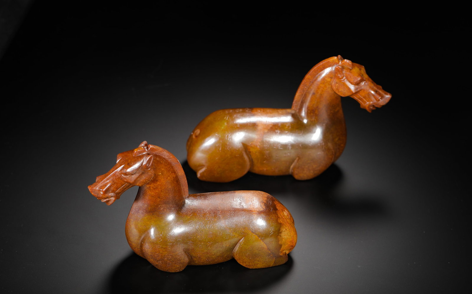 HAN DYNASTY HETIAN JADE WITH A TINTED RECLINING HORSE (1 of 12)