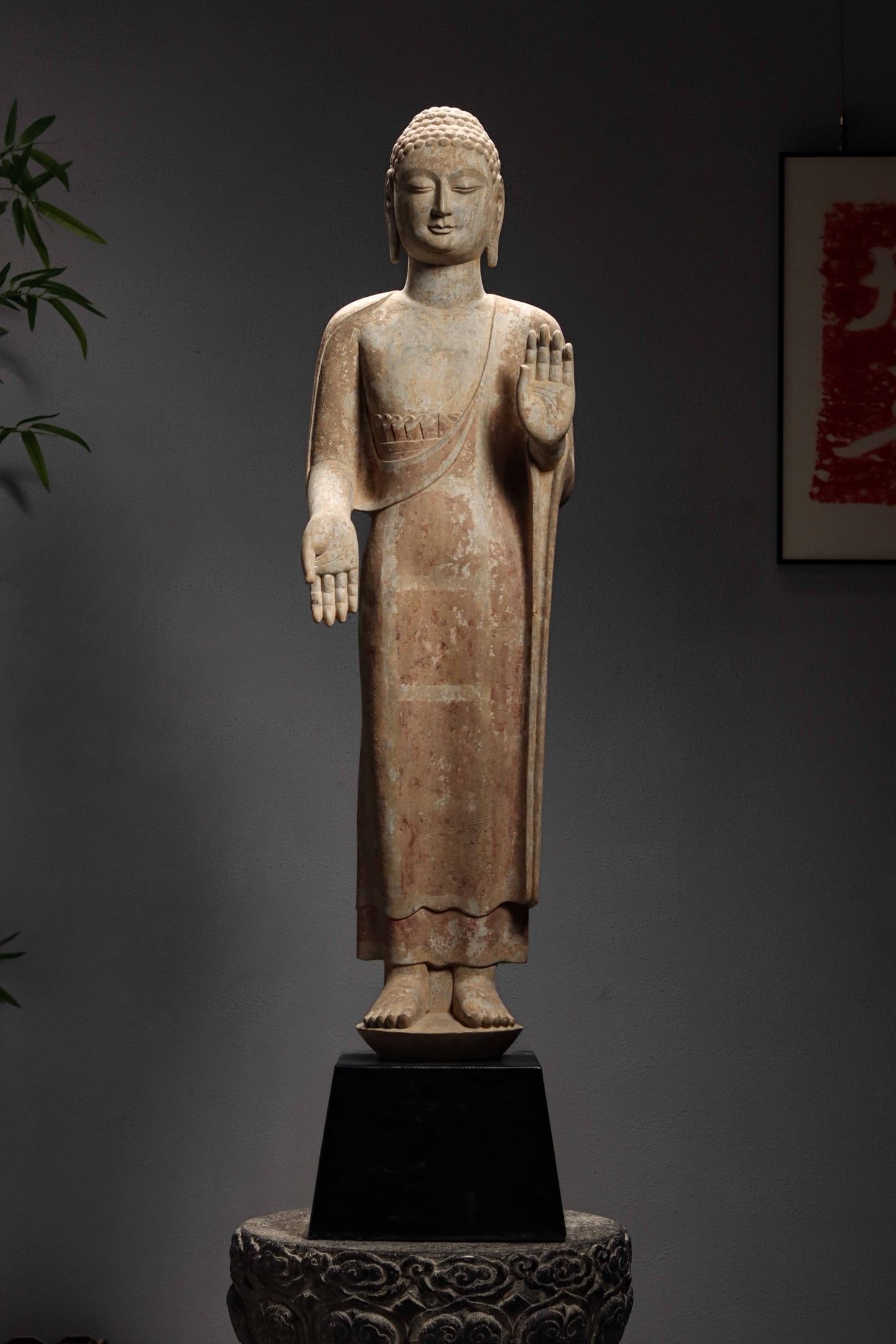 A STANDING STATUE OF BUDDHA IN QINGZHOU STONE FROM THE NORTHERN QI DYNASTY (1 of 9)