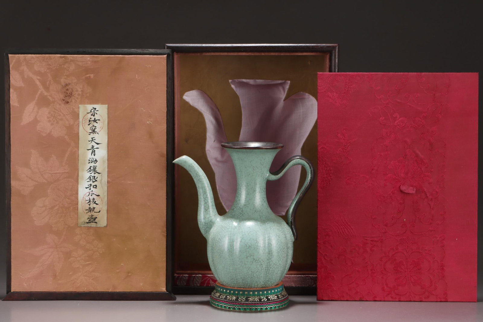 A Ru Ware Celadon Ribbed Ewer With Silver Mount: A Ru Ware Celadon Ribbed Ewer With Silver Mount. Dimensions: 7.68in x 7.68in.