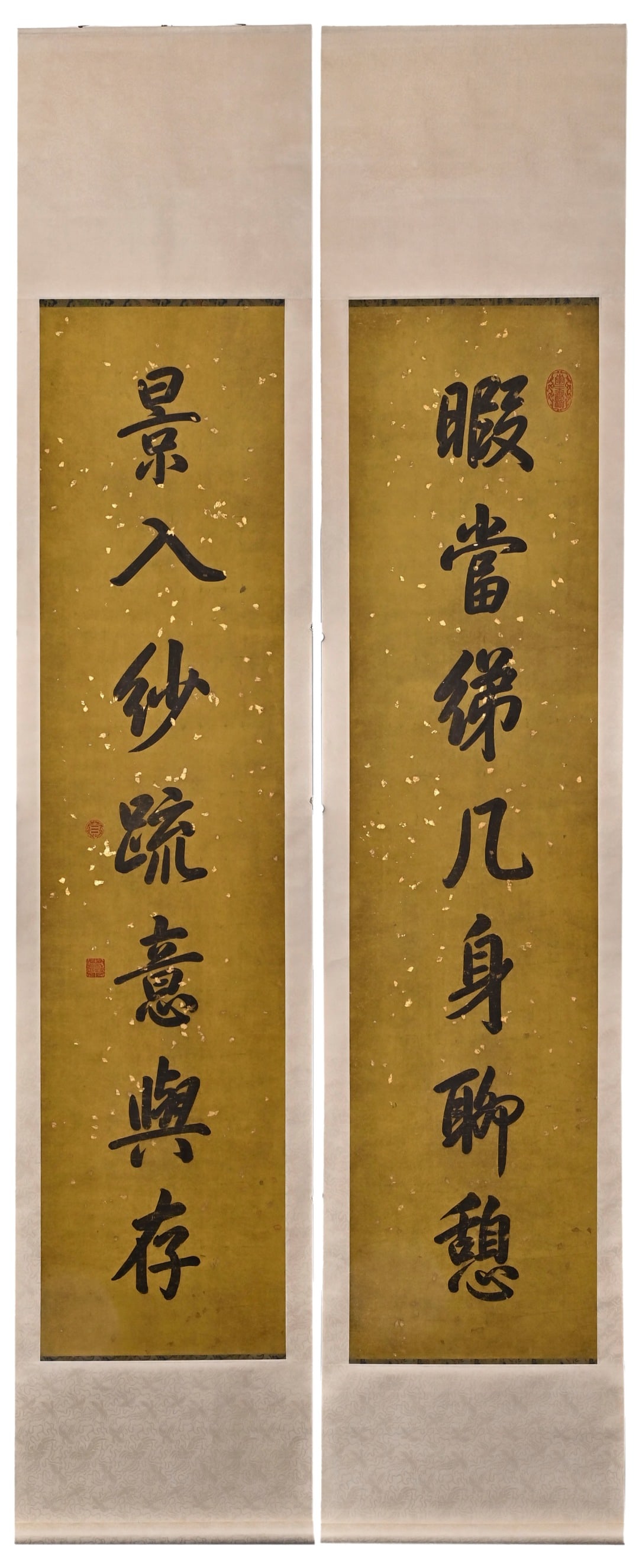 A SEVEN-CHARACTER RUNNING SCRIPT COUPLET WRITTEN BY EMPEROR QIANLONG OF THE QING DYNASTY (1711-1799) (1 of 9)