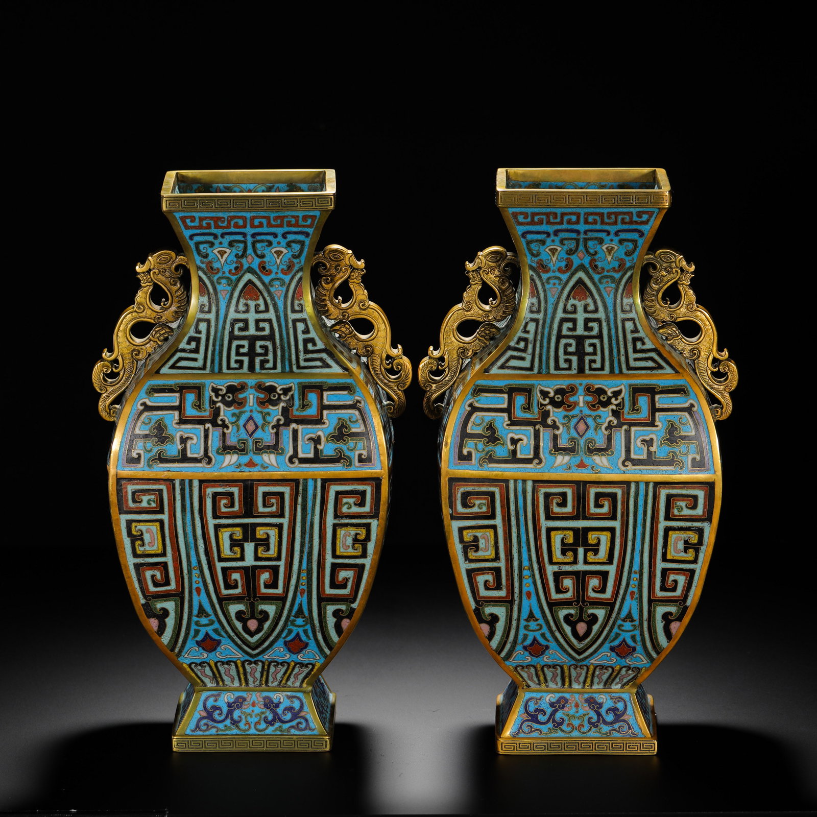 QING DYNASTY COPPER-BODY CLOISONNE ENAMEL IMITATION ANIMAL FACE PATTERN Kui Long EAR-SHAPED VASE: H:32cm (12.60in) W:15.5cm (6.10in) Weight:6070g (13.38lb)This is a pair of Qing Dynasty court cloisonne enamel square vases, featuring exquisite craftsmanship and preserved in complete pair form. The 