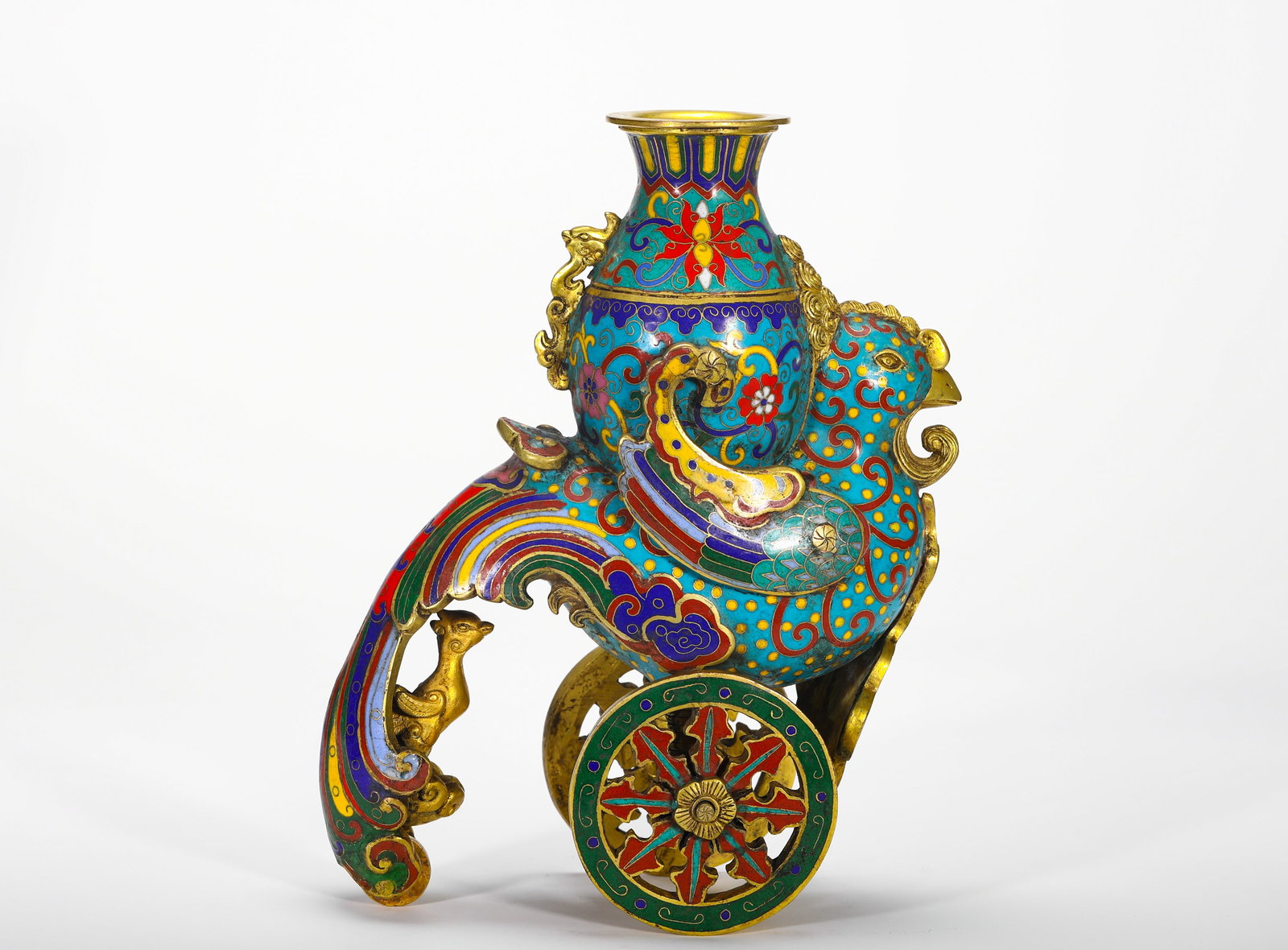 QING DYNASTY QIANLONG COPPER CLOISONNE ENAMEL SKY ROOSTER VASE: H:22cm (8.66in) W:18cm (7.09in) Weight:2790g (6.15lb) This is a cloisonne enamel phoenix censer (Tian Ji Zun) from the Qing Dynasty, crafted during the Qianlong reign. It depicts a phoenix carrying a 