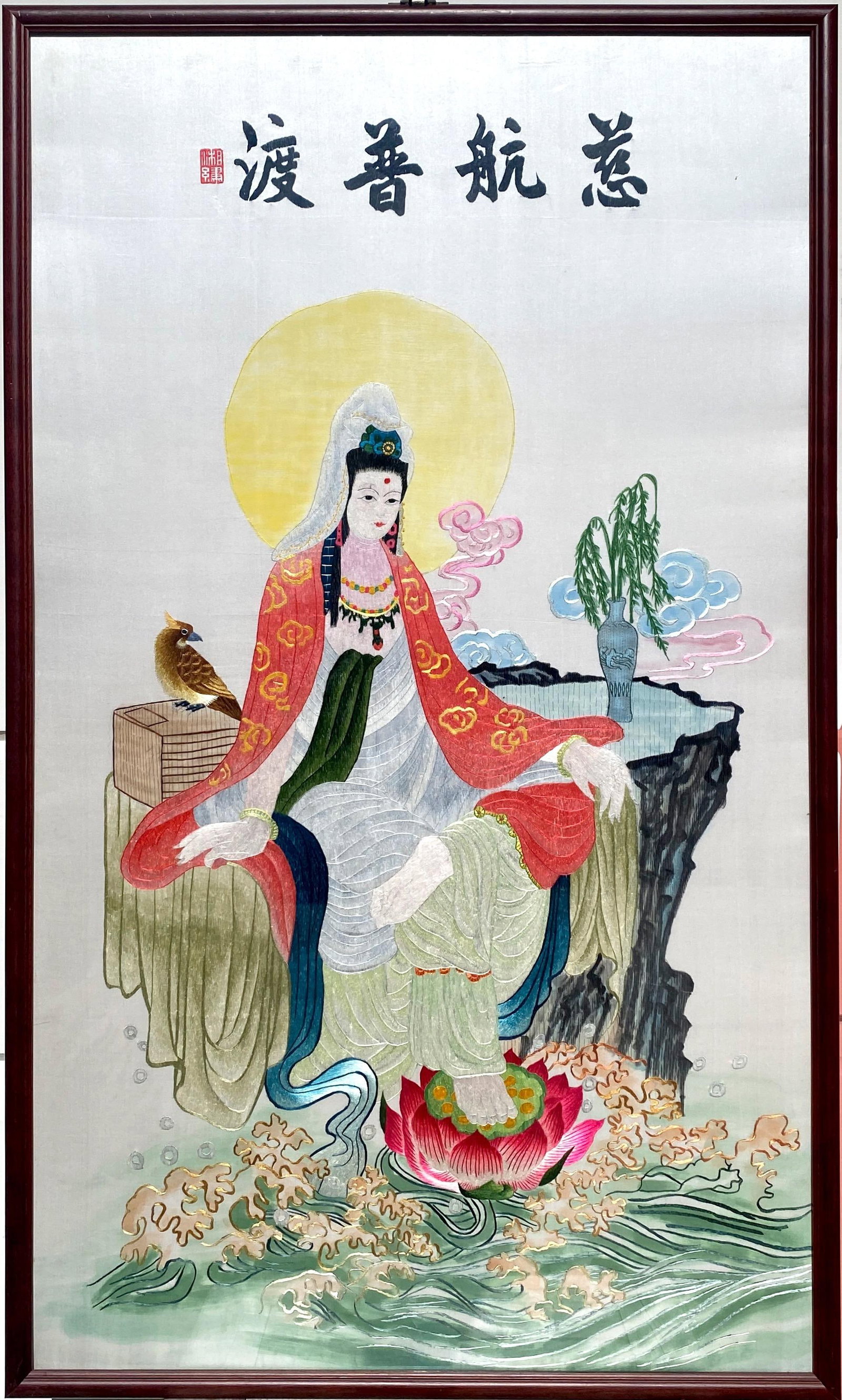 A Framed Embroidered Guanyin Painting: A Framed Embroidered Guanyin Painting. Length: 28.25" Height: 41"
