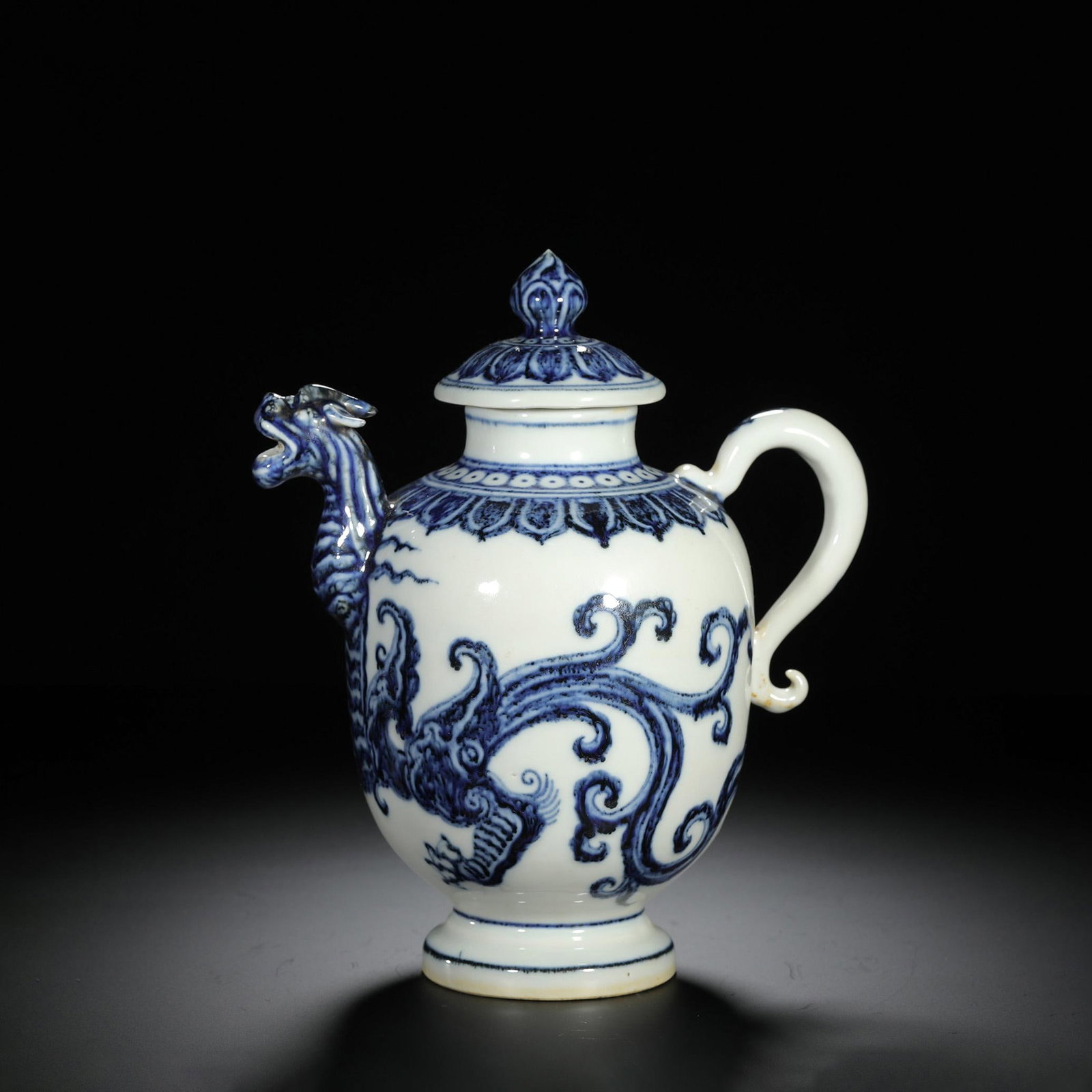 Blue and White Chilong-Head Ewer: Blue and White Chilong-Head Ewer. Length:6.69" Width:4.33" Height:7.87"