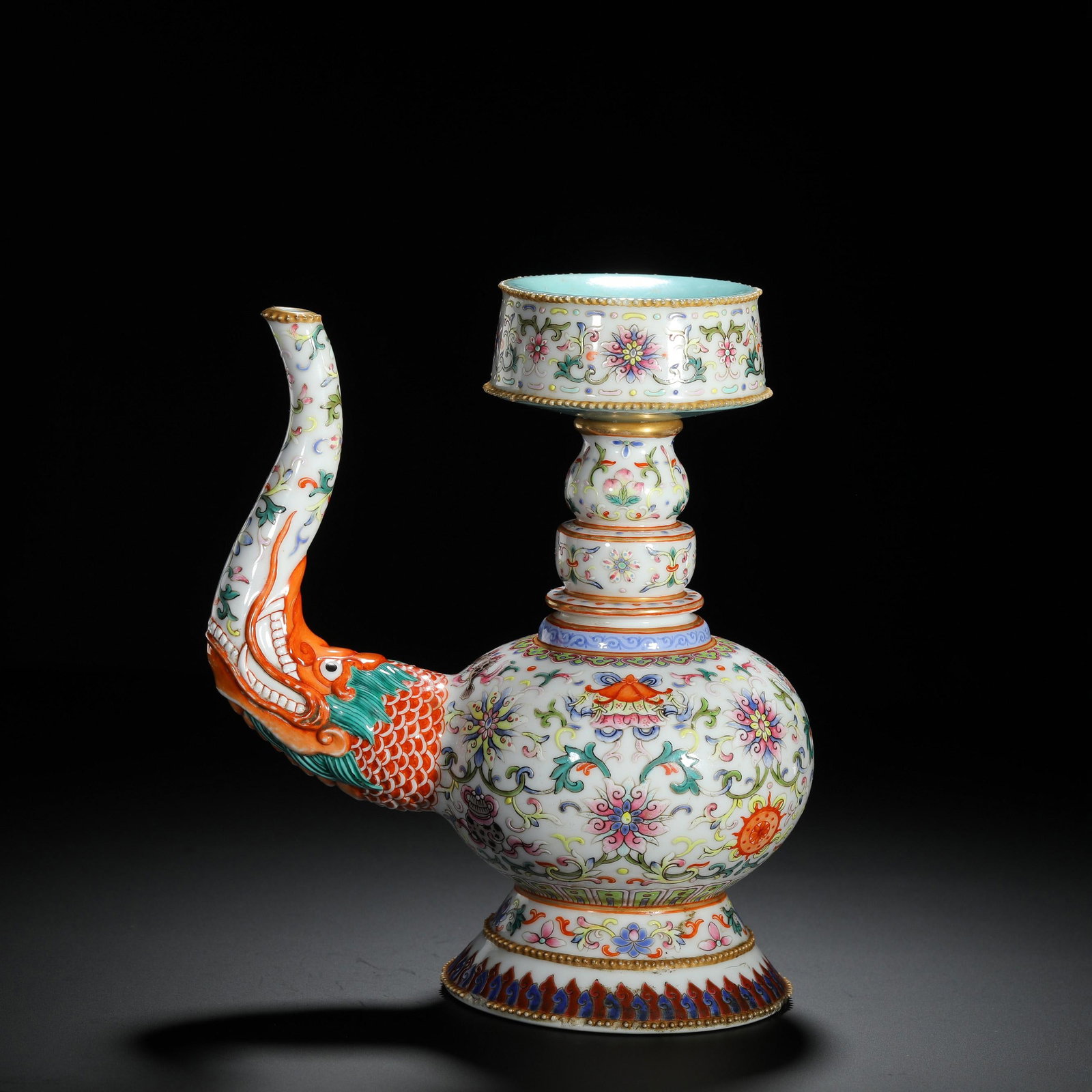 Famille-Rose Eight Buddhist Emblems Bumpa Ewer: Famille-Rose Eight Buddhist Emblems Bumpa Ewer. Length:6.30" Width:3.94" Height:7.68"