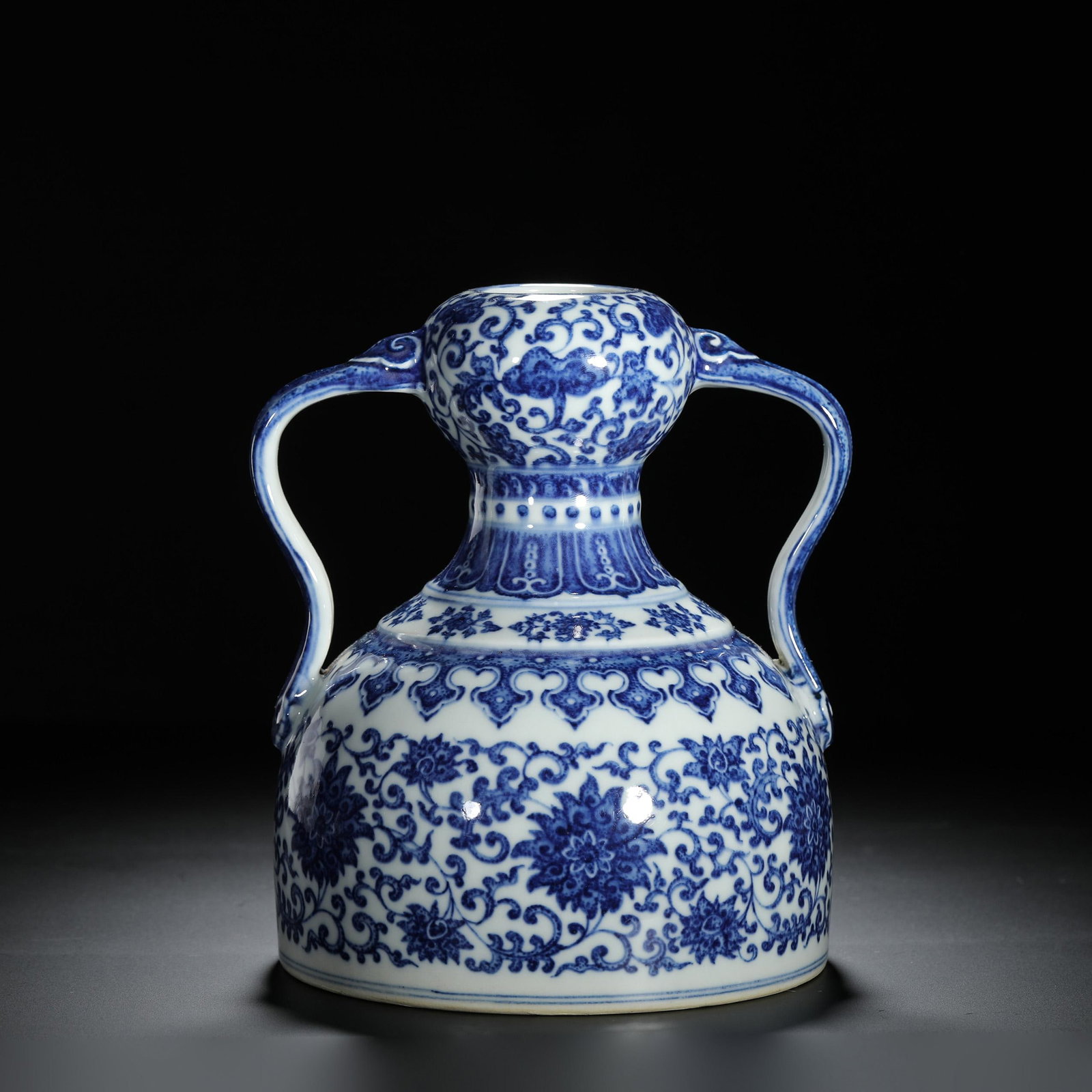 Blue and White Interlocking Lotus Ribbon Vase: Blue and White Interlocking Lotus Ribbon Vase. Diam.5.71" Height:7.09"