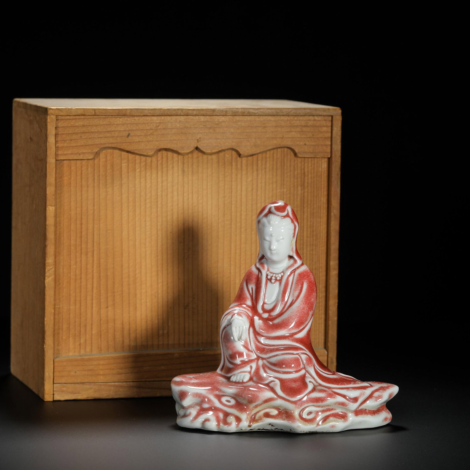 Underglaze Red Guanyin Seated Figure: Underglaze Red Guanyin Seated Figure. Length:5.12" Width:2.95" Height:5.12"