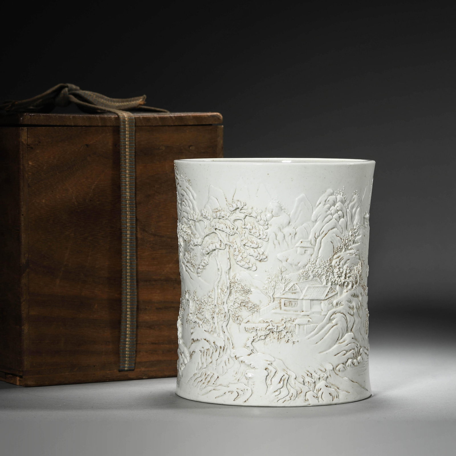 Carved Porcelain Brush Pot: Carved Porcelain Brush Pot. Diam.4.84" Height:5.51"