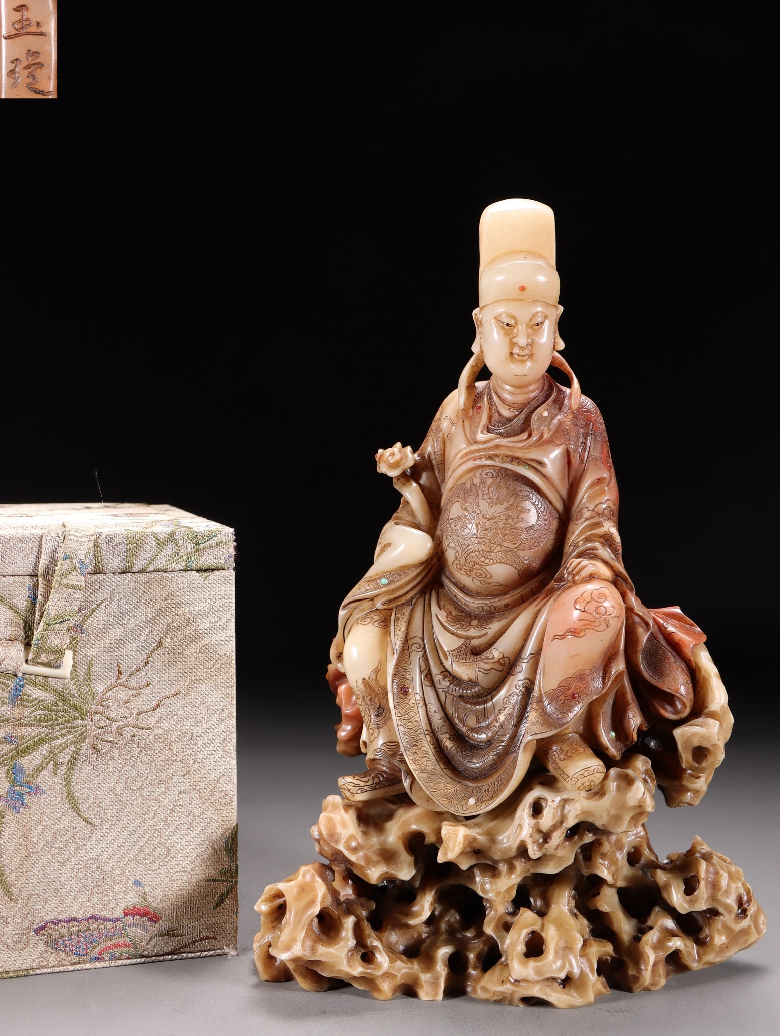 A Shoushan Stone Seated Wenchang Figure: Dimensions: 9.25in x 6.10in x 3.74in; Weight: 3.80lbs.