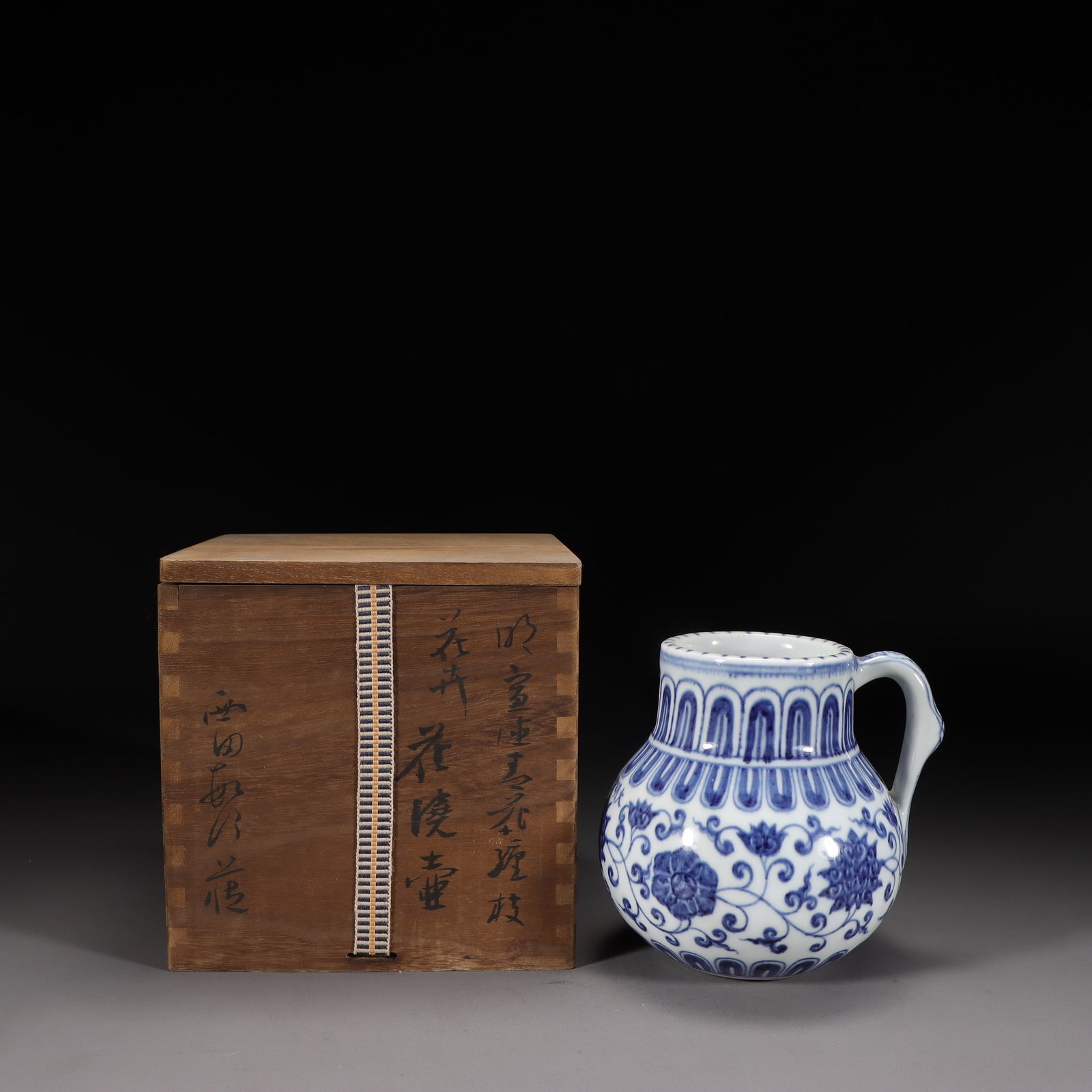 A Blue and White Floral Vase: Height: 5.63in; Diameter: 5.12in; Weight: 1.62lbs.