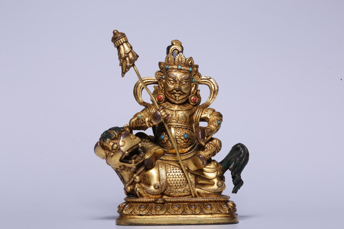 A Gilt Bronze Treasure Guardian King Statue: Dimensions: 5.51in x 3.23in x 3.35in; Weight: 1.70lbs.