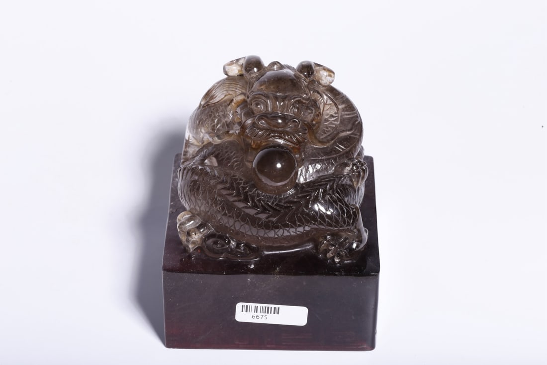 A Smoky Quartz Dragon Seal: Height: 3.94in; Length: 3.54in; Width: 3.54in; Weight: 3.13lbs.