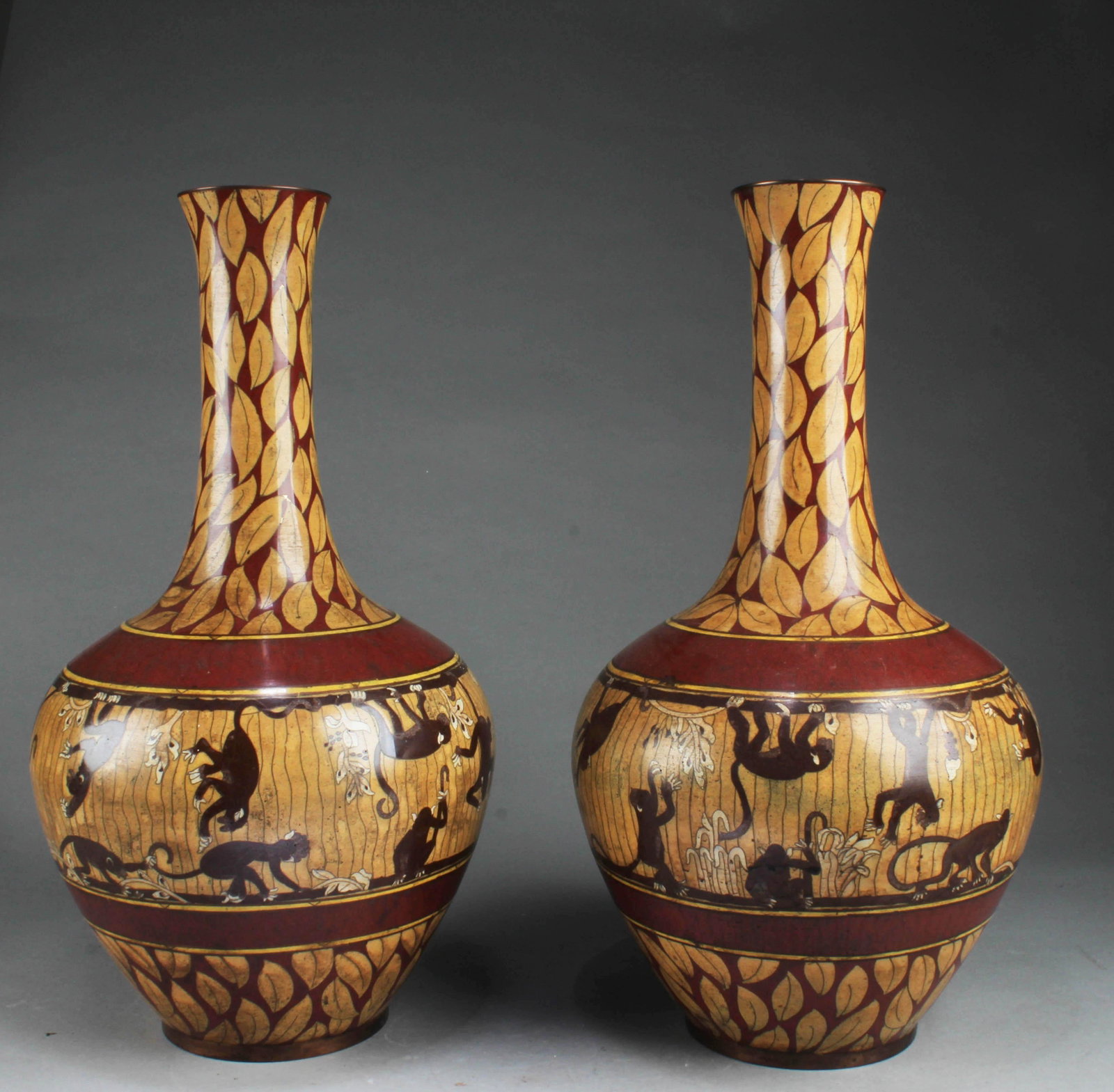 A Pair of Cloisonne Vases: A Pair of Cloisonne Vases. Height: 18.5"