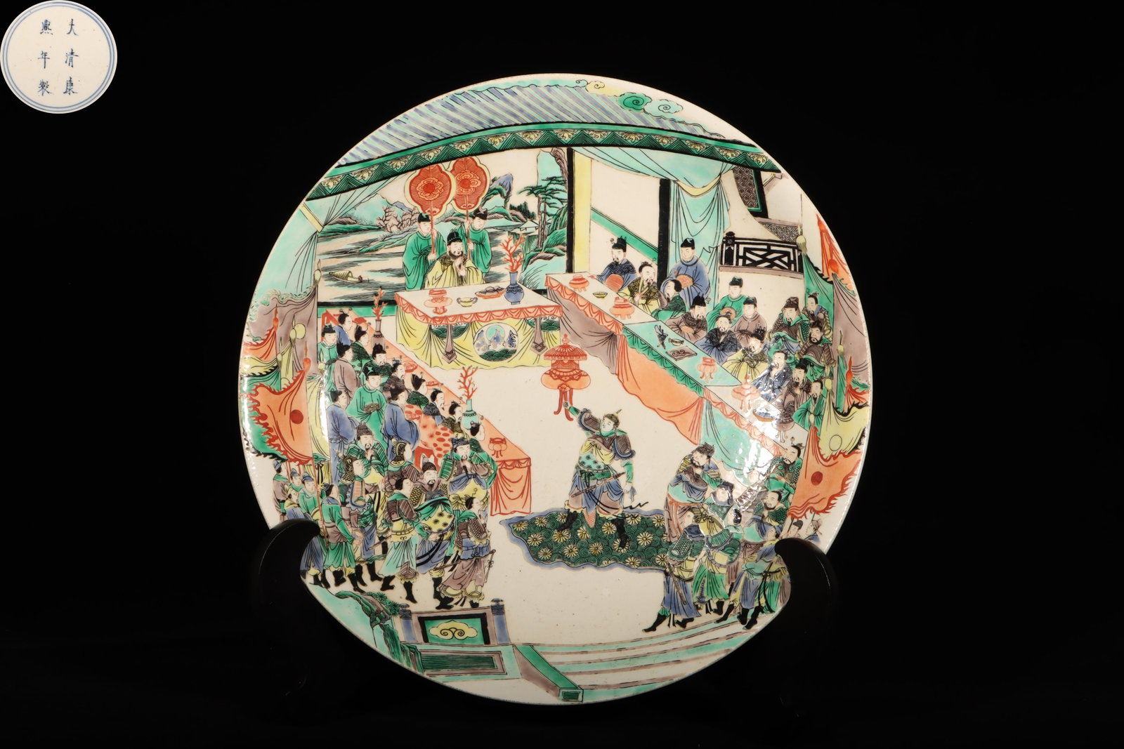 A Large Wucai Glaze Figure Story Pattern Plate: A Large Wucai Glaze Figure Story Pattern Plate. "KangXi" mark at base. Height: 2.68in; Diameter: 16.73in.