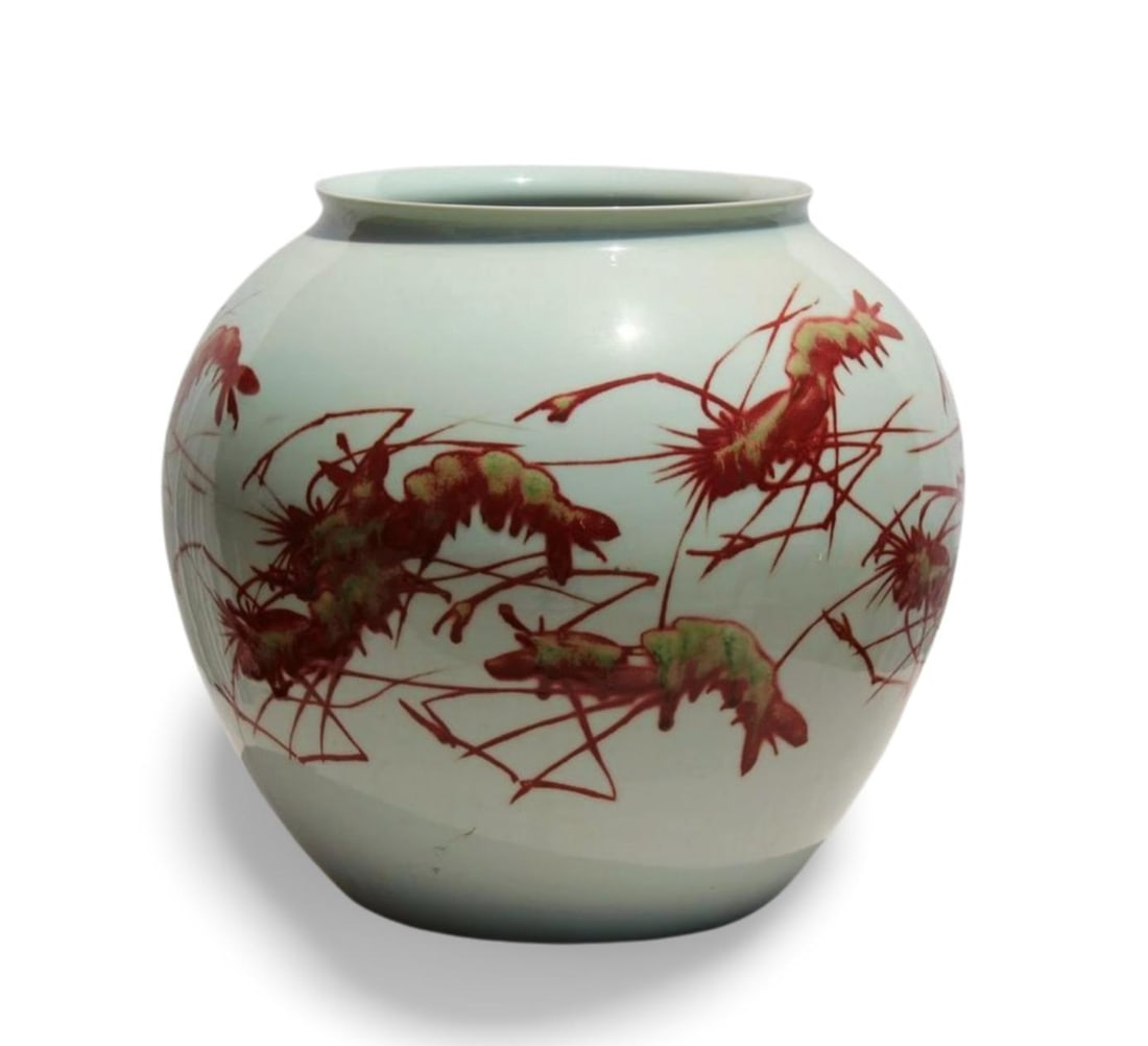 A Porcelain Jar: A Porcelain Jar. Dimension: 14.75" x 15".