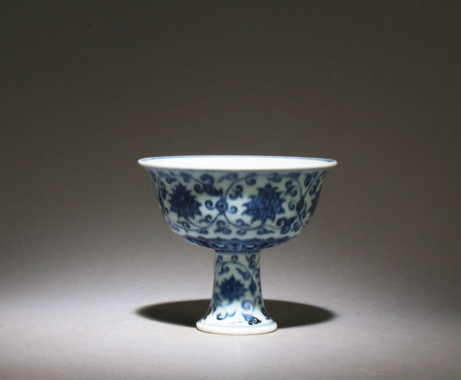 A Blue and White Stem Cup: A Blue and White Stem Cup. Dimensions: 4.25" x 4.75".