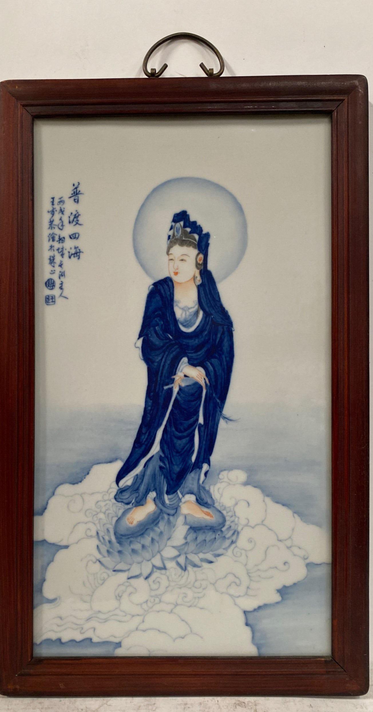 A Hardwood Framed Porcelain Guanyin Plaque: A Hardwood Framed Porcelain Guanyin Plaque. Length: 14.75" Height: 29.5" (Frame)
