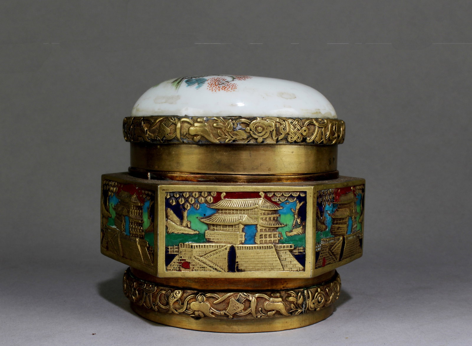 A Chinese Enamel Brass Snuff Jar: A Chinese Enamel Brass Snuff Jar. Dimensions: 3.75" x 3.75".