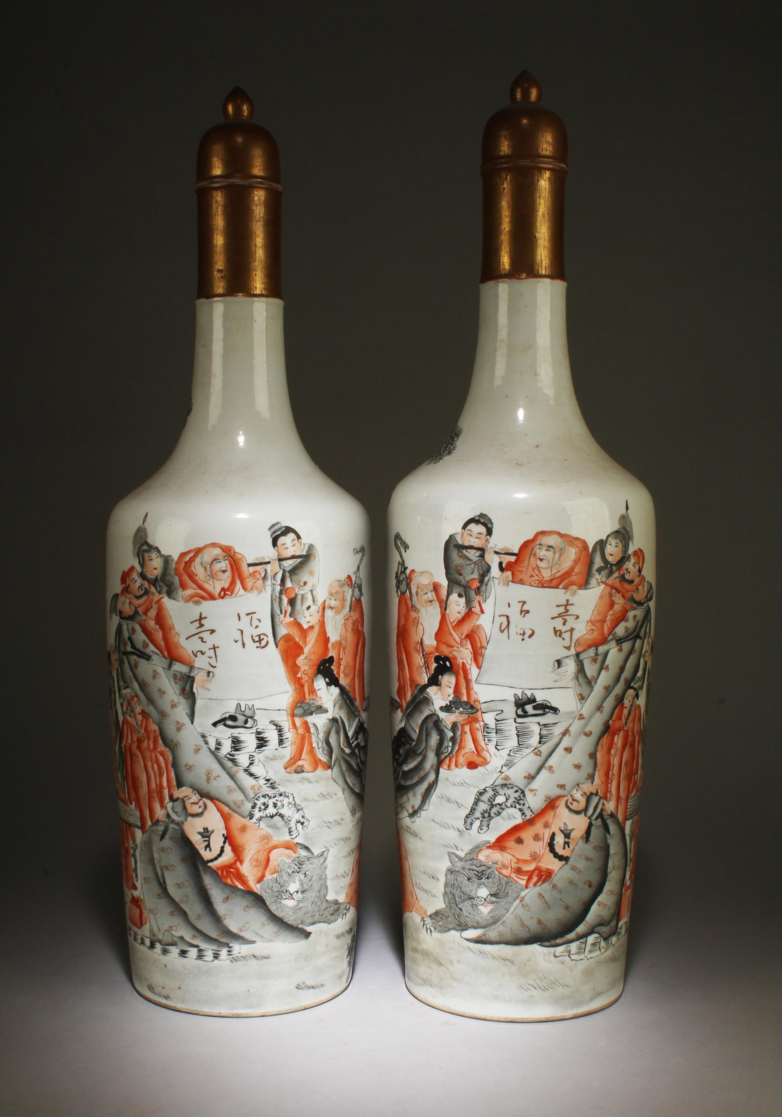 A Pair of Porcelain Vase with Figure Motif: A Pair of Porcelain Vase with Figure Motif, decorated with pictures of various immortals. Comes with lid. A Six character mark is imprinted at the base. Height: 21"