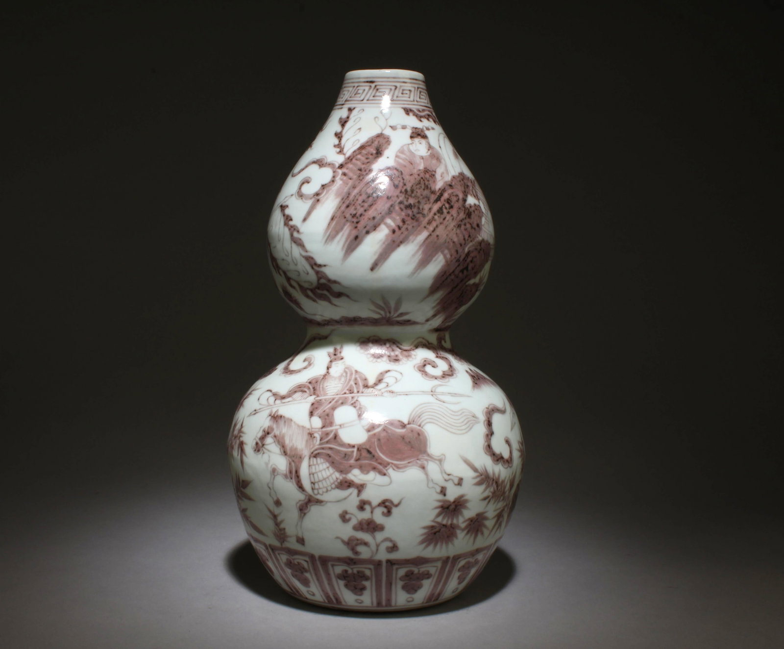 A Underglazed Red Double Gourd Vase: A Underglazed Red Double Gourd Vase. Dimensions: 12.5" x 6.5".