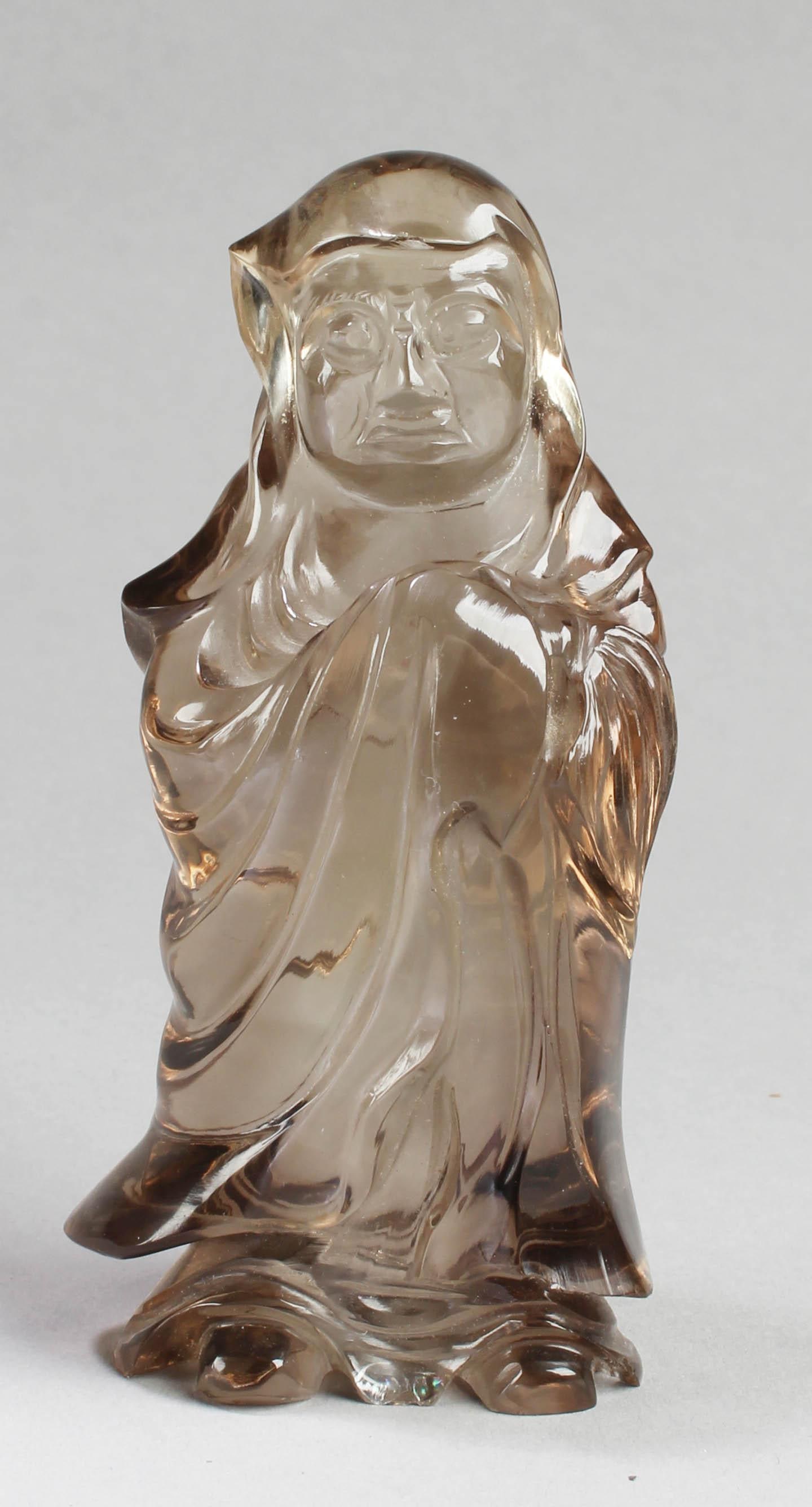 Antique Chinese Crystal Ornament: Antique Chinese Crystal Ornament, depicting a man in flowing robe. Height: 4.25"