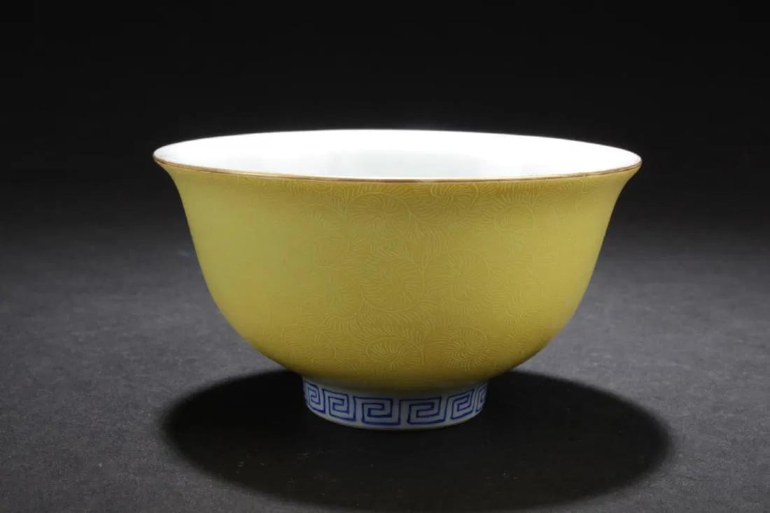 Chinese Famille Jaune Porcelain Cup: Chinese Famille Jaune Porcelain Cup, depicting a deer in the interior and the foot is decorated with key-fret design. A four character mark is imprinted at the bottom. Diameter: 3.5"