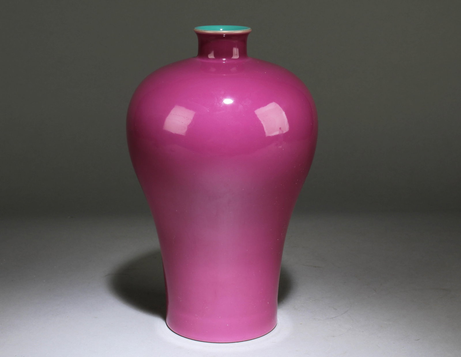 A Chinese Yanzihong Vase: A Chinese Yanzihong Vase. Dimension: 9" x 5.5"