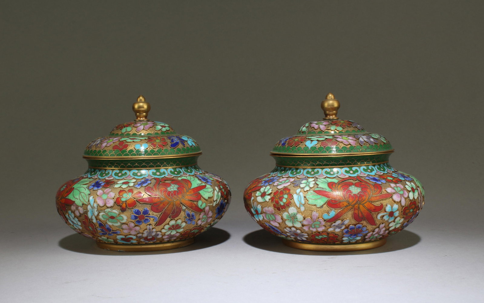 A Pair of Floral Cloisonne Enamel Jars with Lid: A Pair of Dark Floral Cloisonne Enamel Vases. Dimensions:5.25" X4.3"