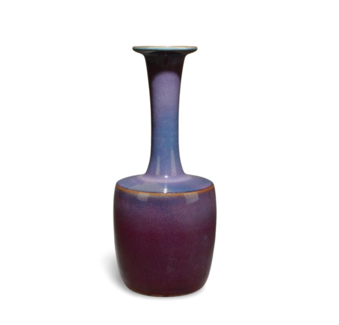 A Junao Vase: A Junao Vase. Dimension: 11.25" x 4.75".