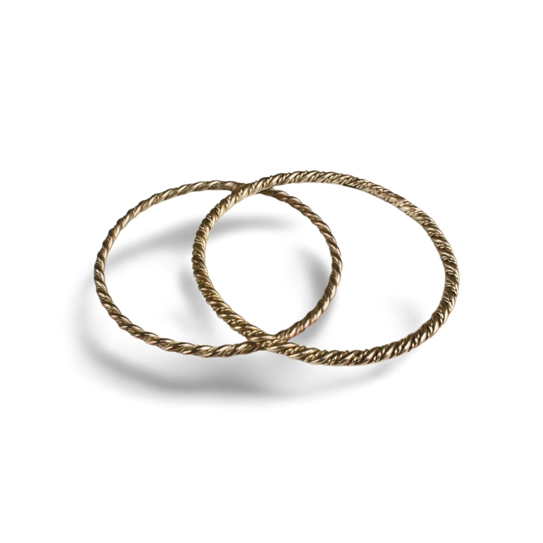 A Pair of 925 Silver Bracelets: A Pair of 925 Silver Bracelets. Diameter: 2.5 "