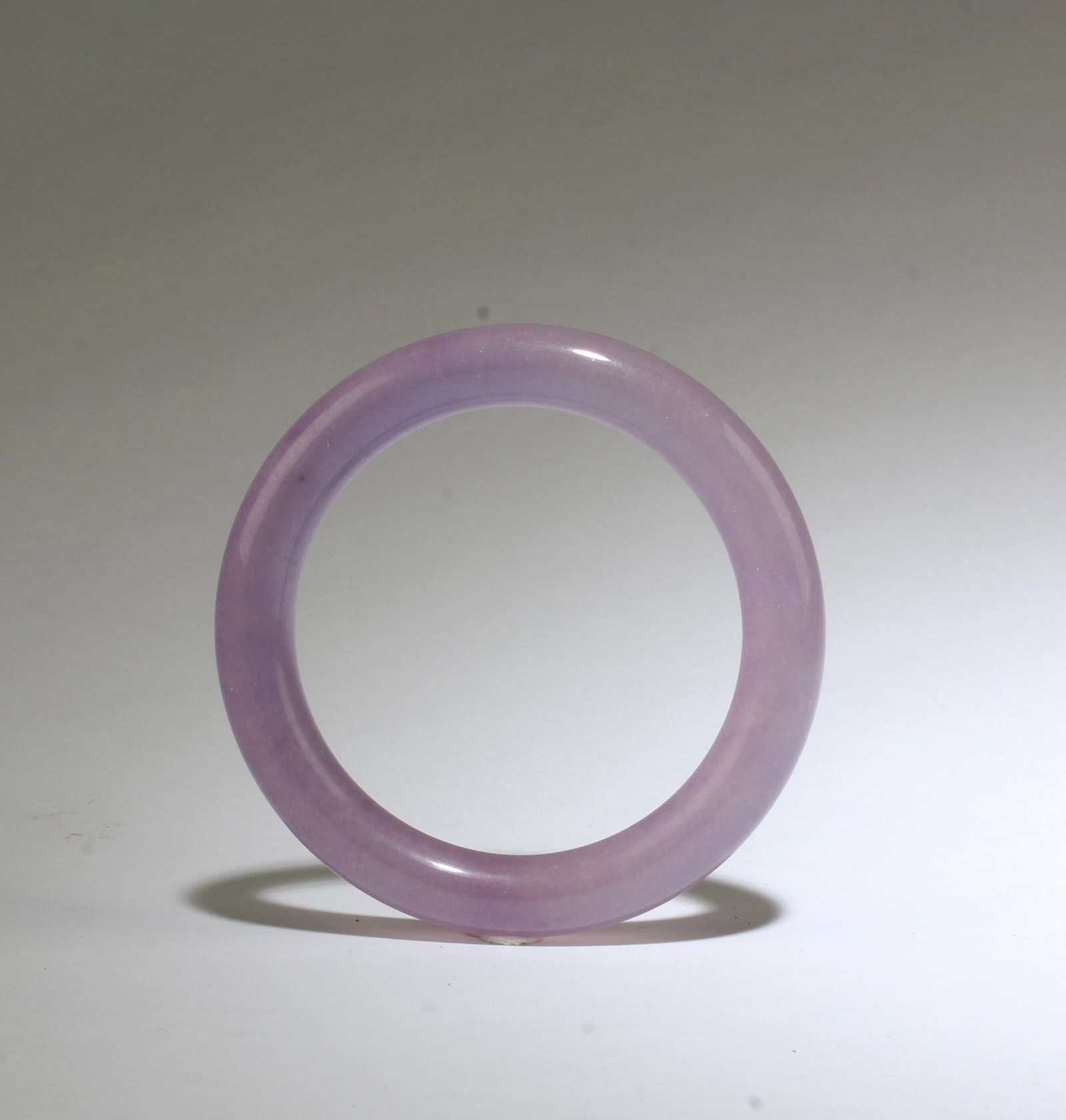 A Jadeite Like Bangle: A Jadeite Like Bangle. Inner Diameter: 2.25"