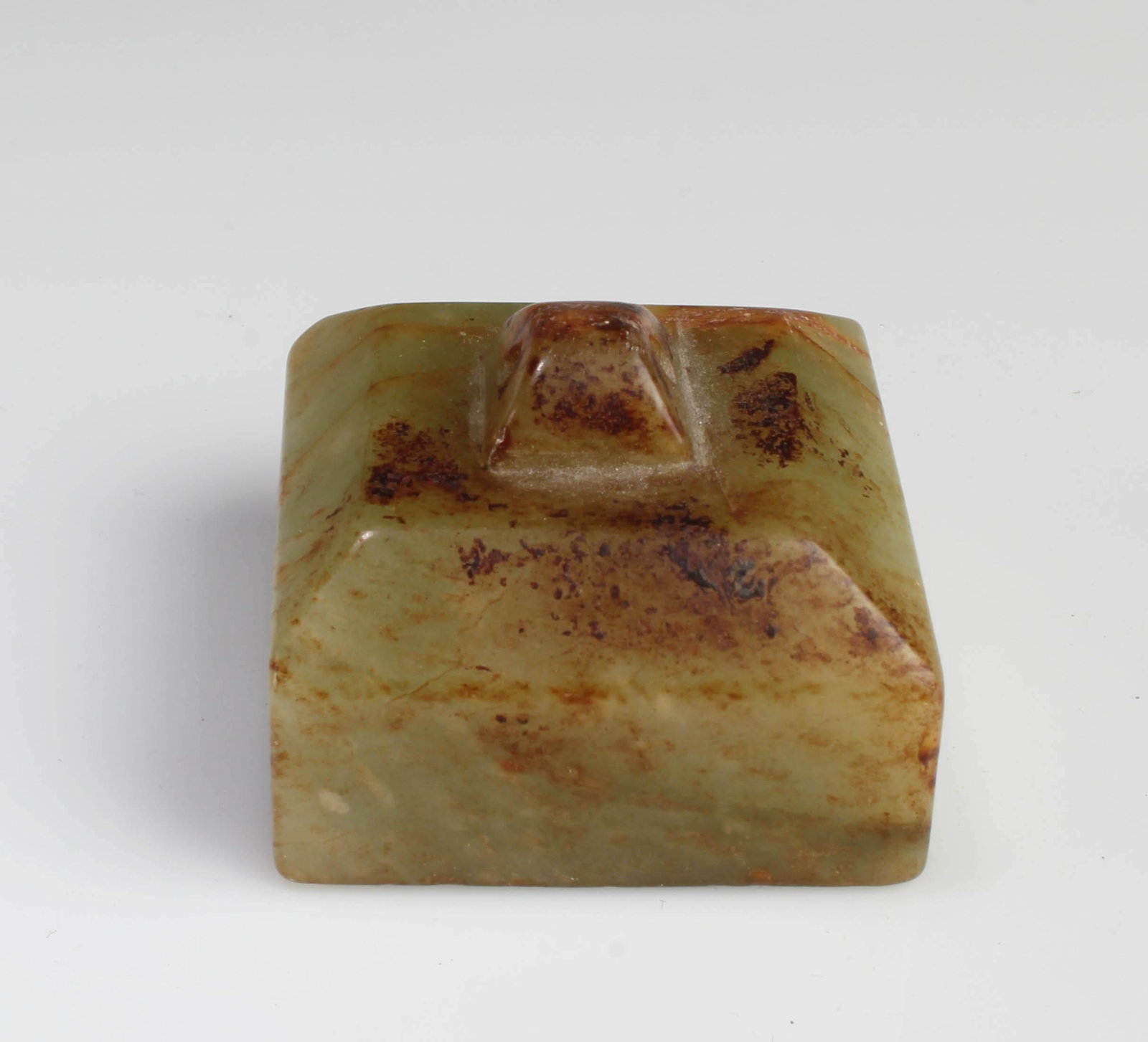 A Square Shaped Carved Jades Seal: A Square Shaped Carved Jade Seal. Length: 1.75" Width: 1.75"