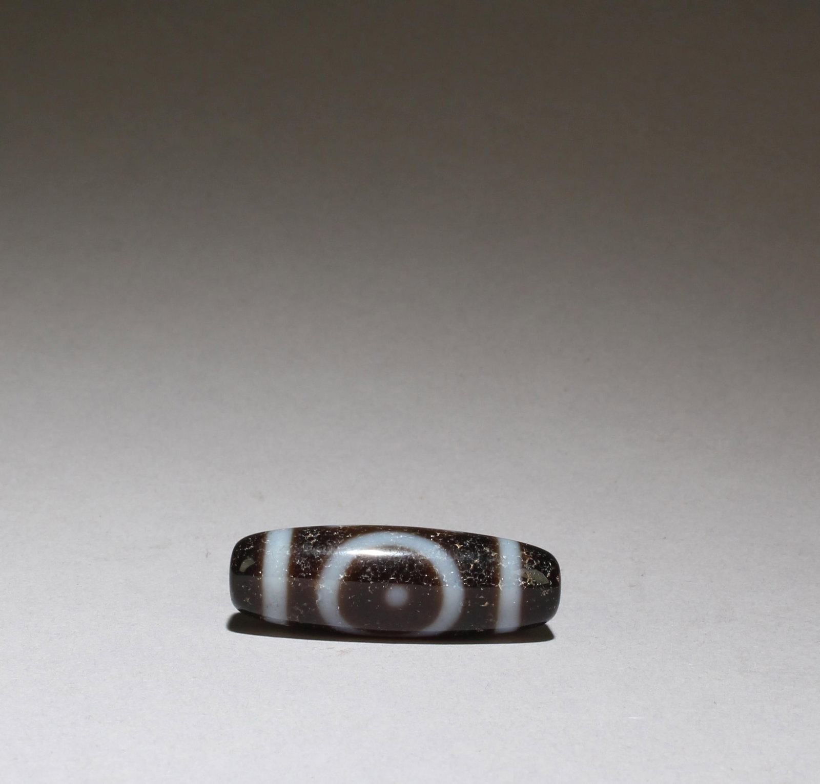 Dzi Bead: Dzi Bead. Length: 1.25"