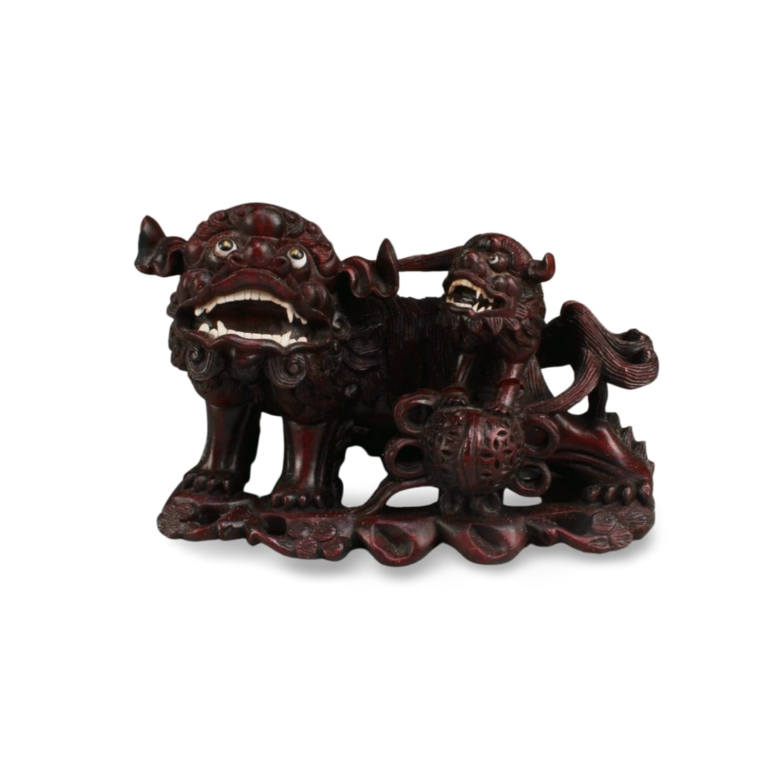 A Carved Wooden Foo Lion Figurine (1 of 4)