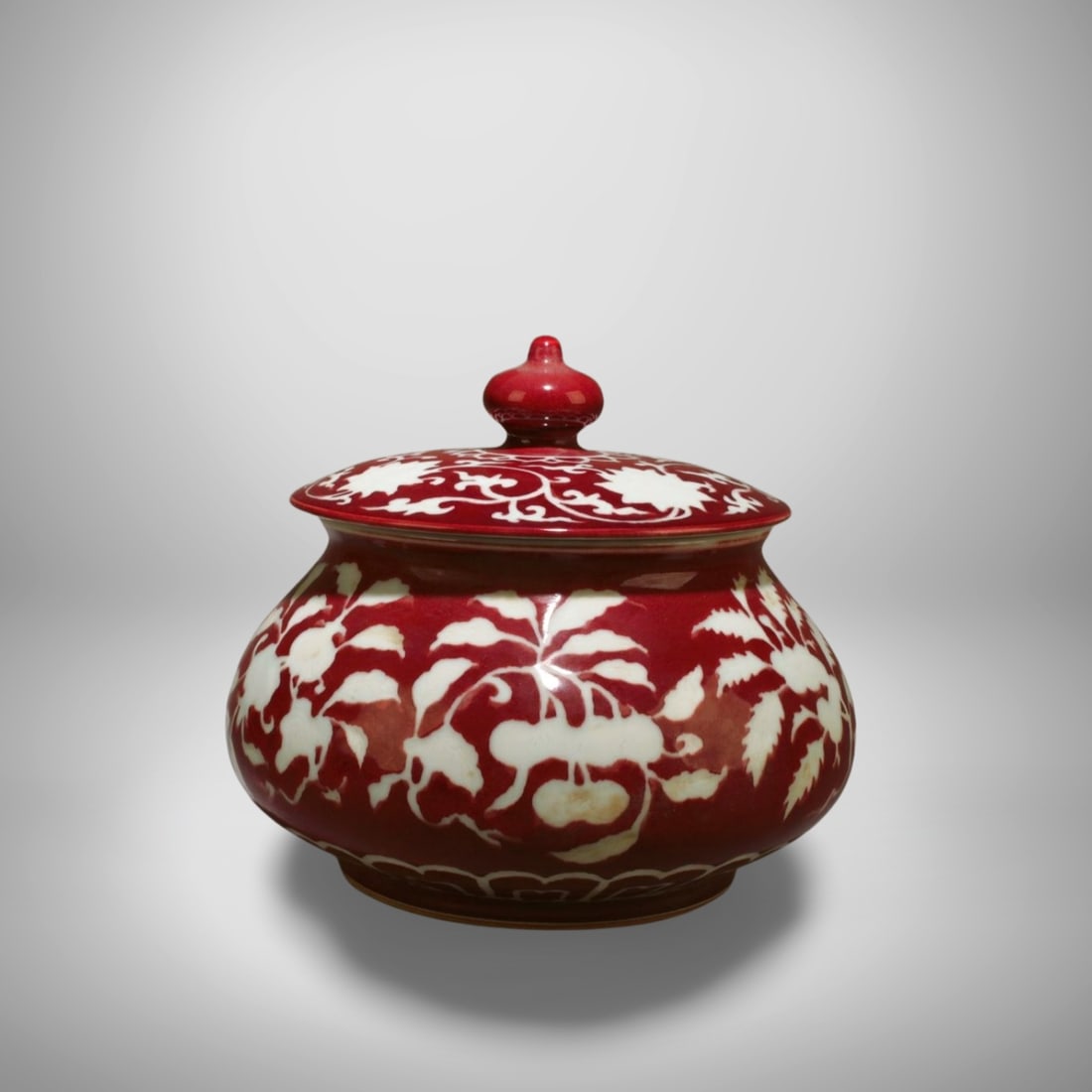 A Red and White Container with Lid: A Red and White Container with Lid. Dimension: 8.5" x 7".