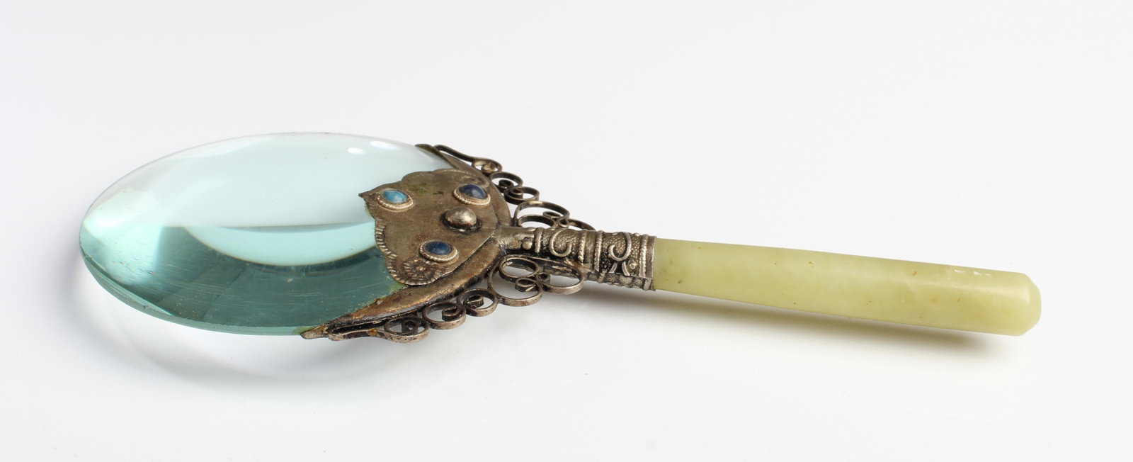 A Hand Held Magnifying Glass: A Hand Held Magnifying Glass. Length: 6.75"