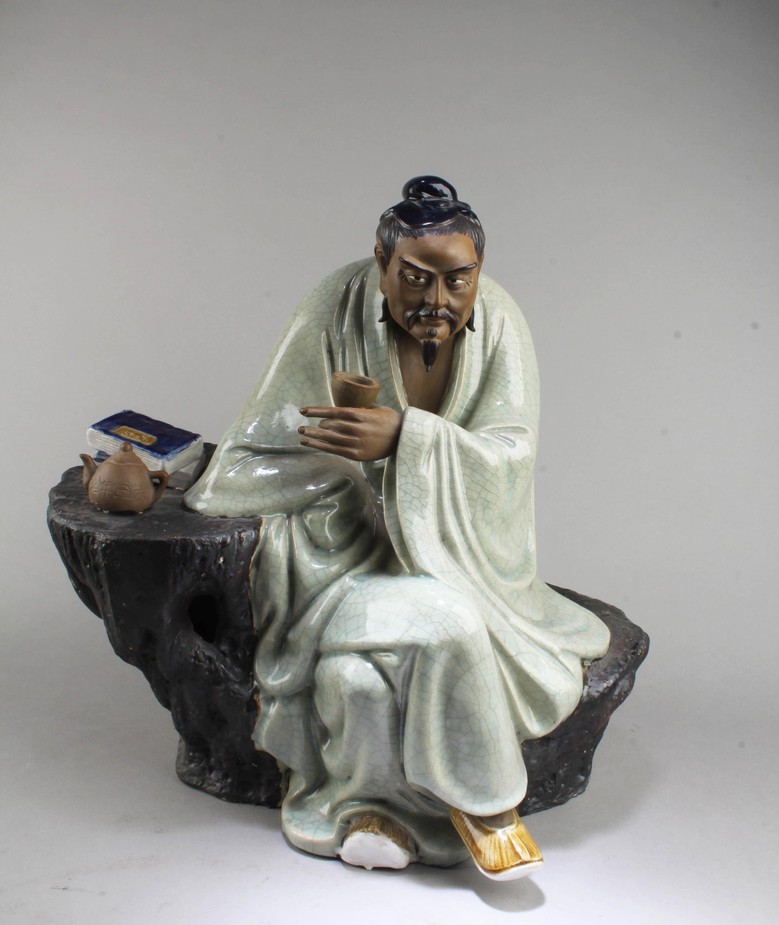 Chinese Shiwan Figurine: Chinese Shiwan Figurine. Length: 17" Height: 17".