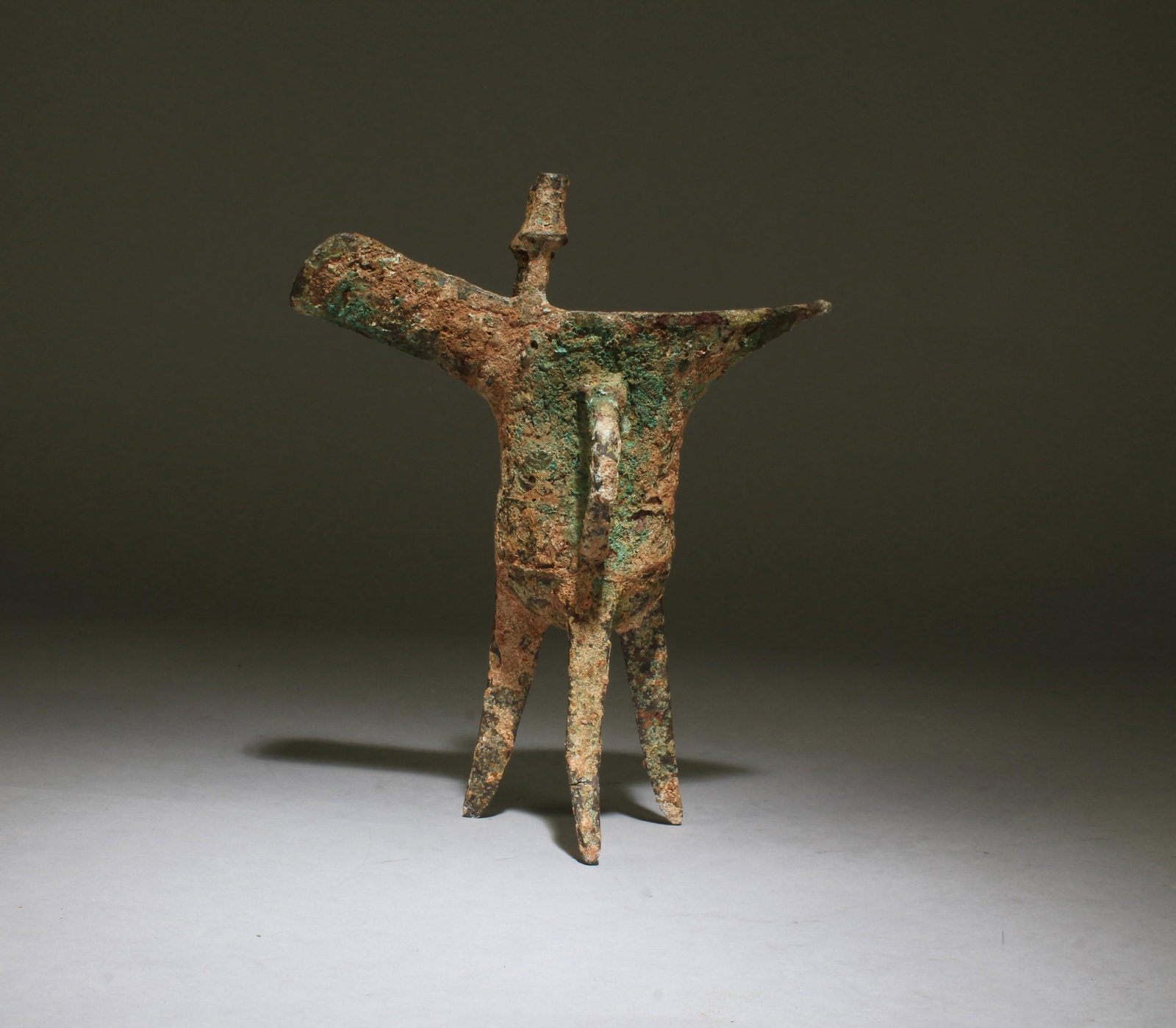 Chinese Bronze Tripod Vessel: Chinese Bronze Tripod Vessel. Height: 7.5 "