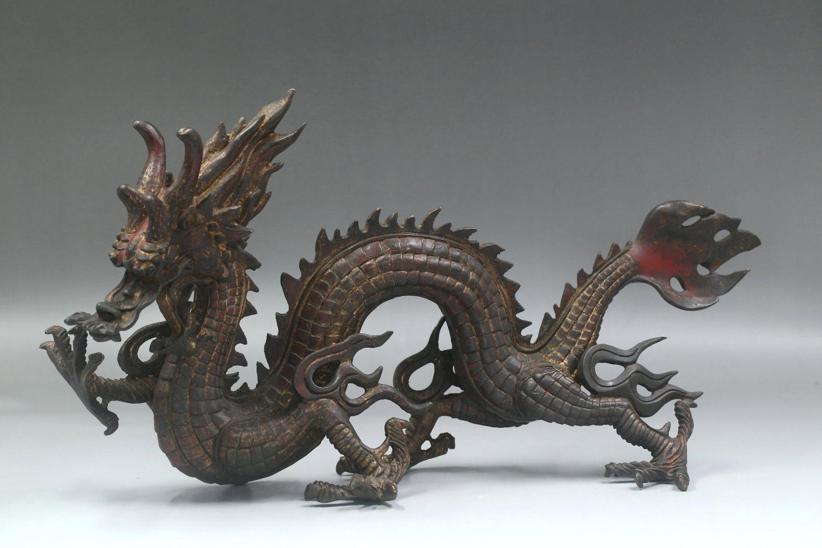 A Bronze Dragon Ornament: A Bronze Dragon Ornament Length: 20" Height: 11"