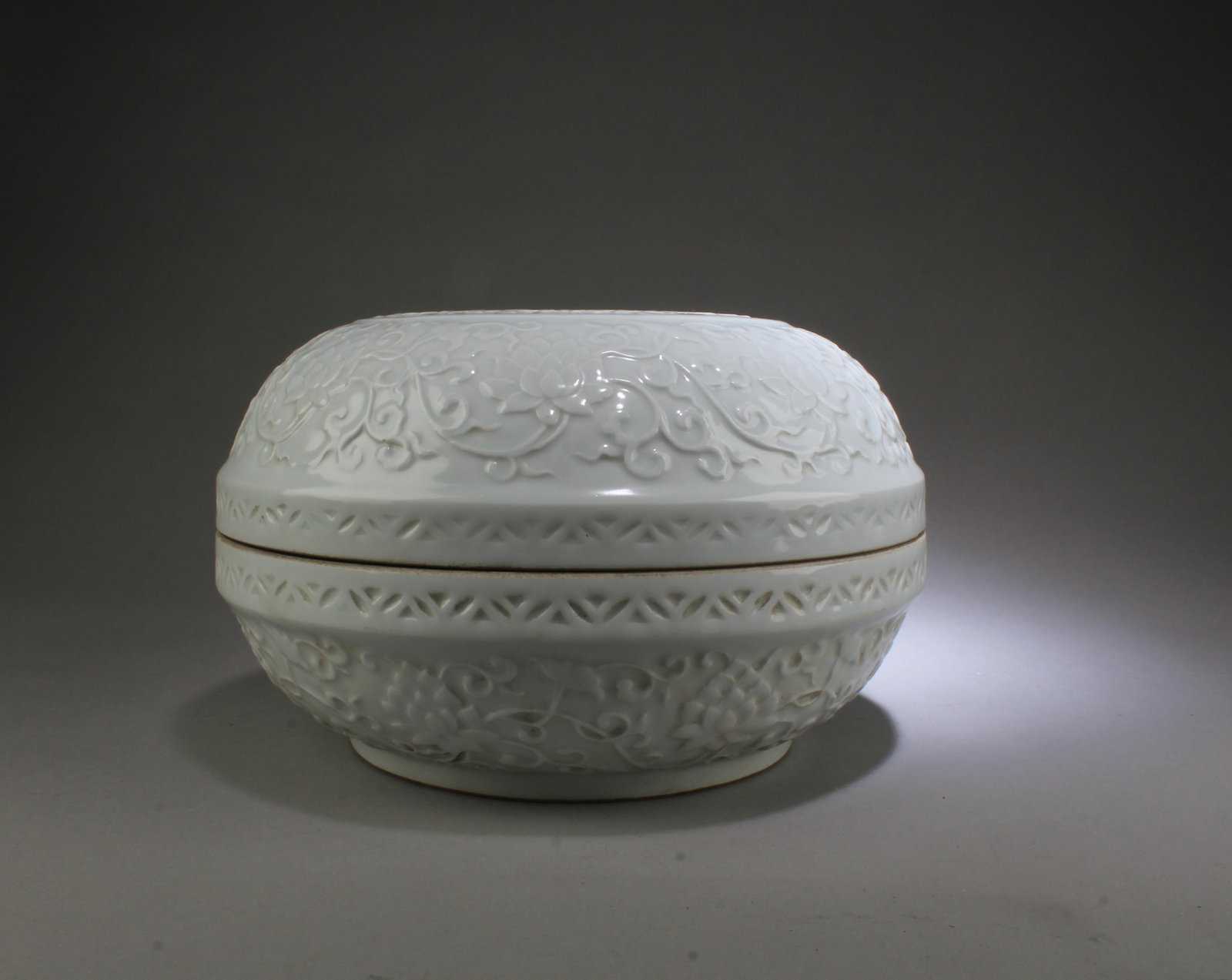 A Porcelain Round Container: A Porcelain Round Container. 'XuanDe' mark. Diameter: 10.5" Height: 6.5"