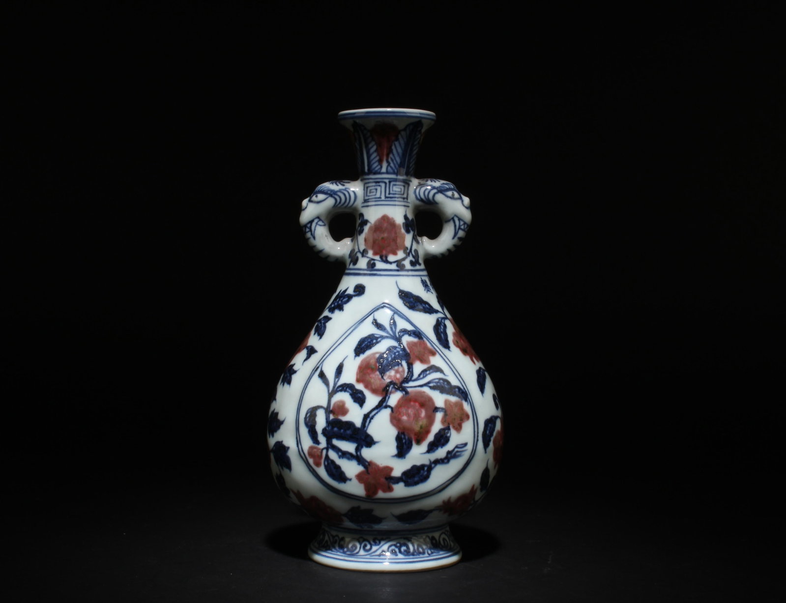 A Red and Blue & White Porcelain Vase: A Red and Blue & White Porcelain Vase. Dimensions: 9.75" x 5".